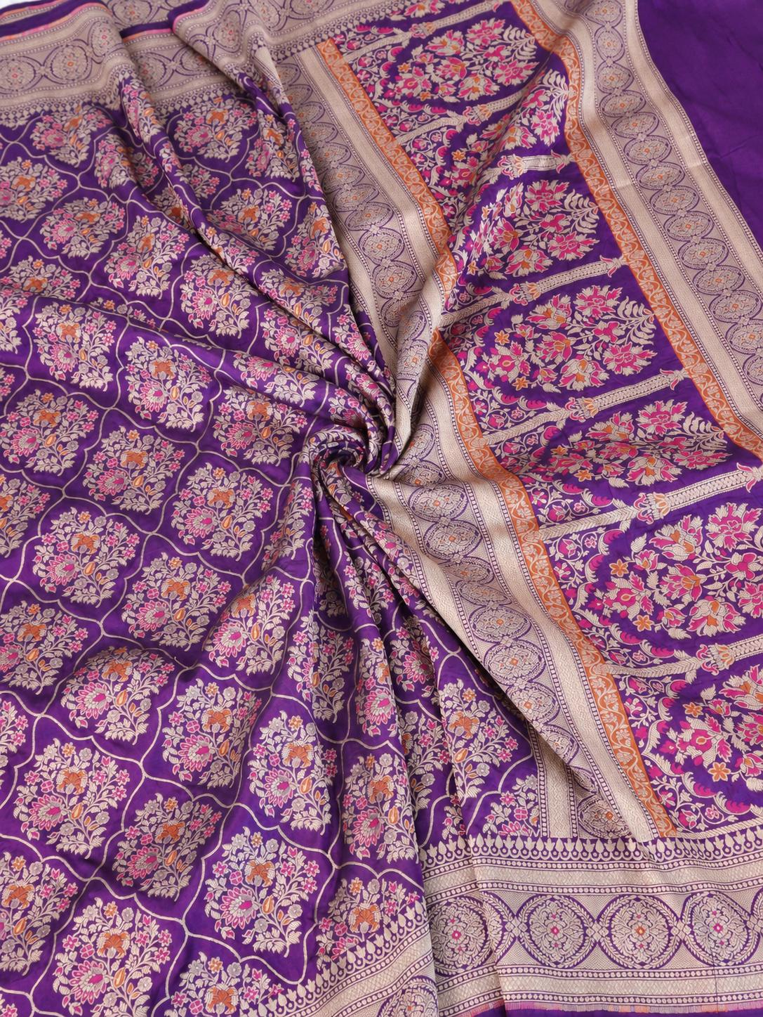 Rich royal purple with pale gold toned zari and vibrant pink and rust-orange floral accents Katan Silk Banarasi saree front drape view