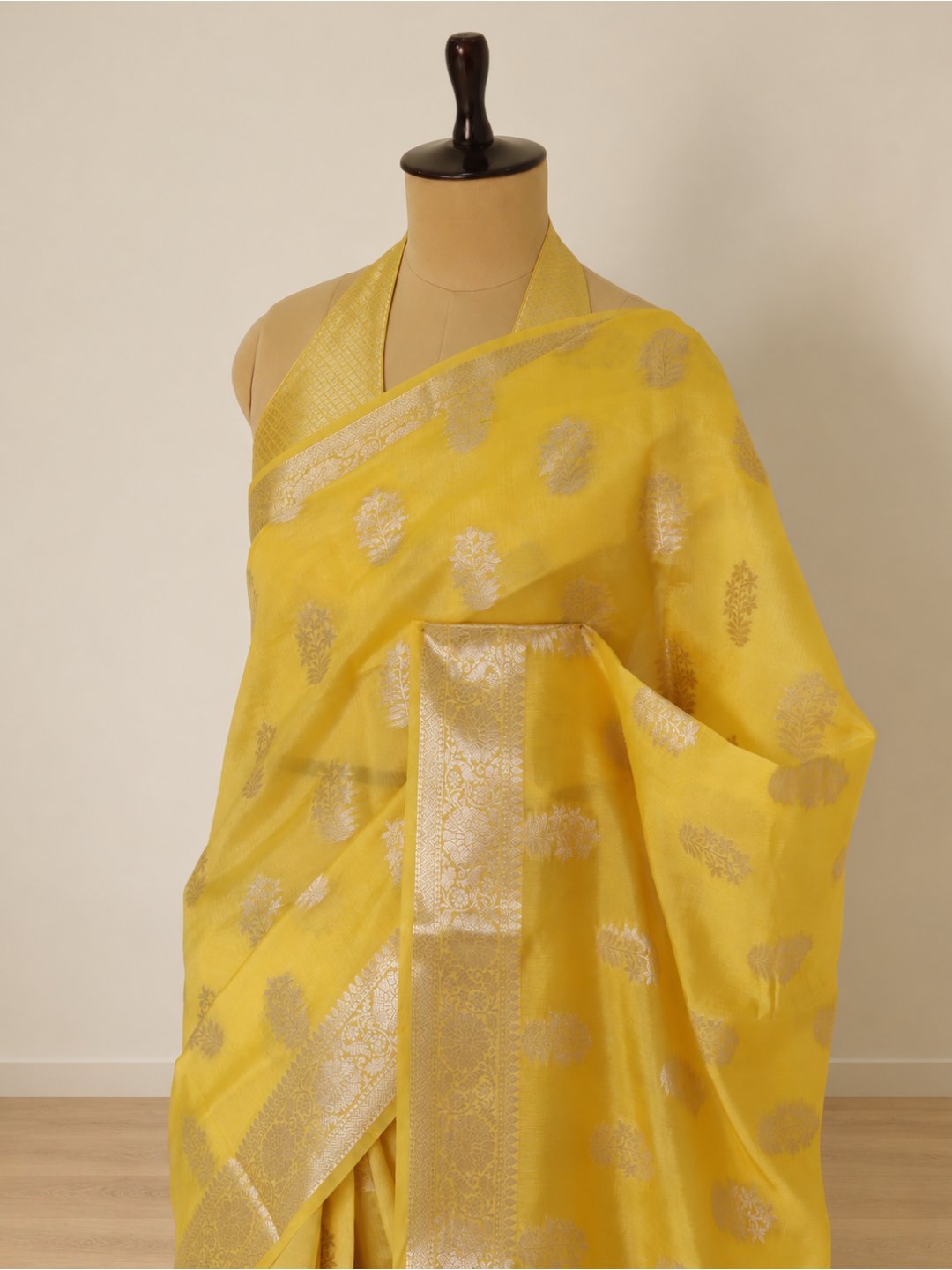 Bright lemon yellow with light gold-toned detailing Viscose saree Banarasi saree front drape view