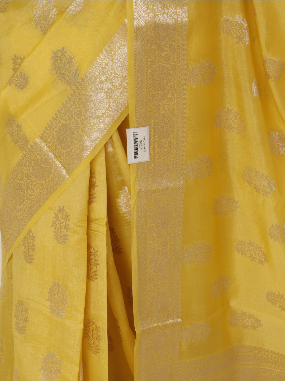 Bright lemon yellow with light gold-toned detailing Viscose saree Banarasi saree folded view