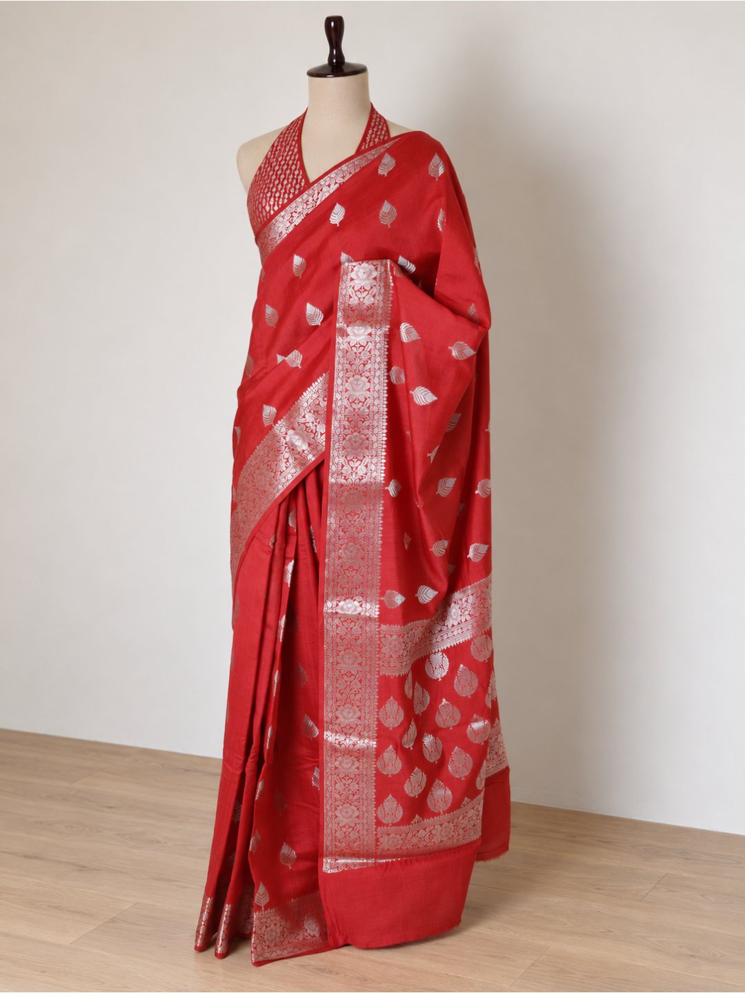 Bright red with silver-toned detailing Chiniya Silk Banarasi saree pallu detail