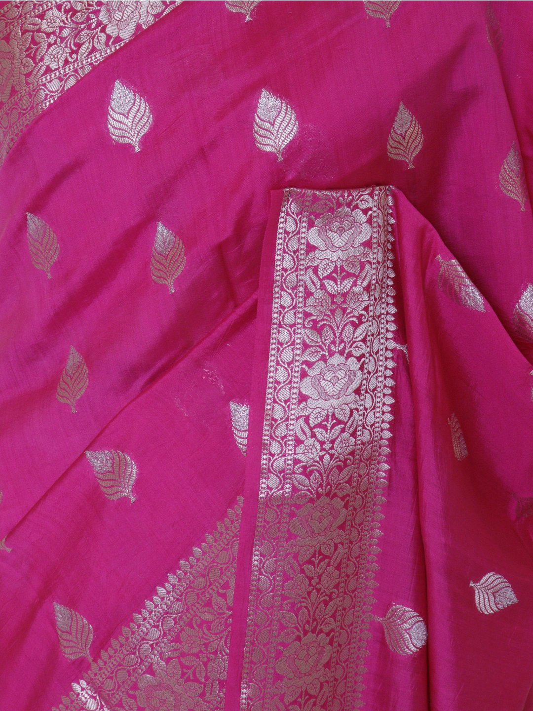 Rani pink with silver-toned detailing Chiniya Silk Banarasi saree full spread