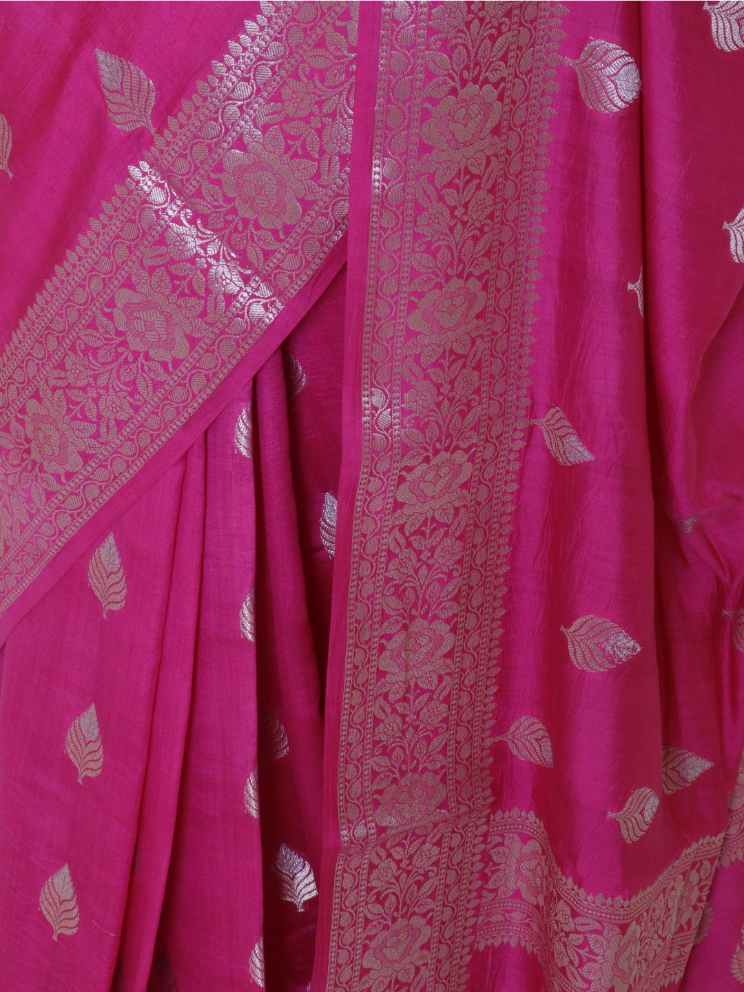 Rani pink with silver-toned detailing Chiniya Silk Banarasi saree zari work detail