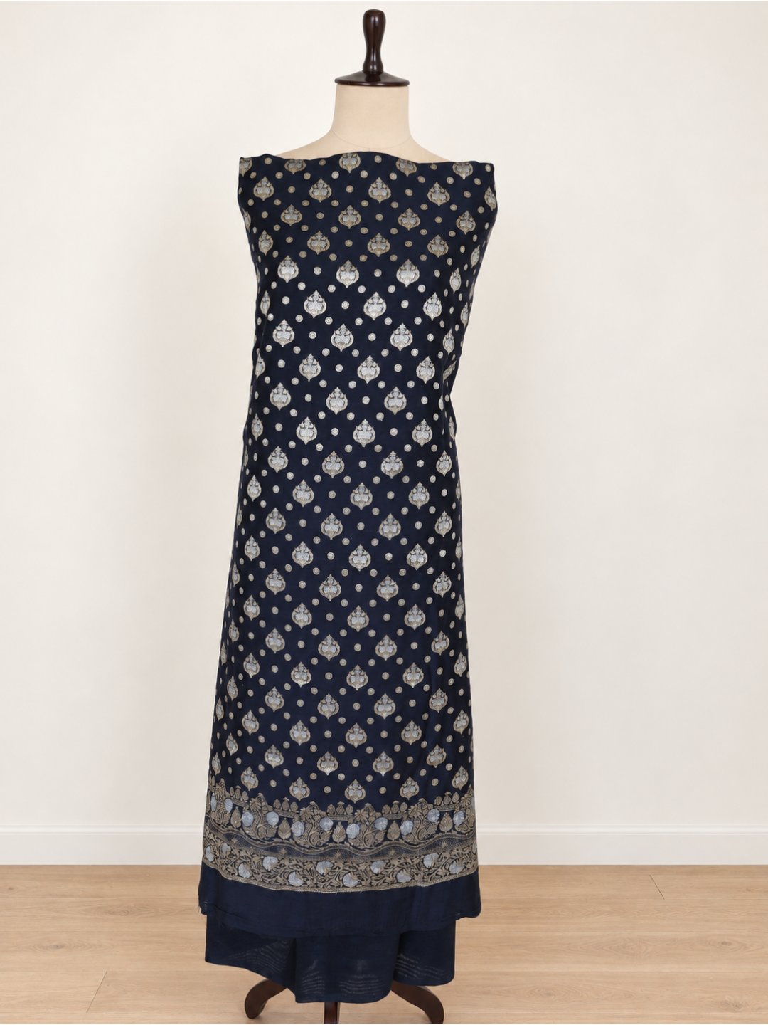 Black with gold-toned detailing and soft blue floral accents Cotton Banarasi suit bottom detail