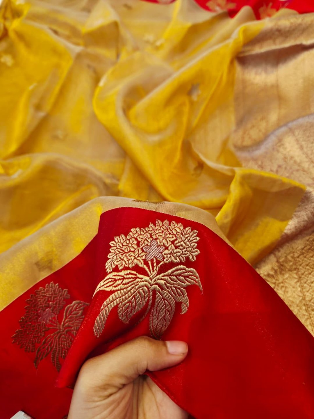 Golden with Red Tissue Silk Banarasi saree border closeup