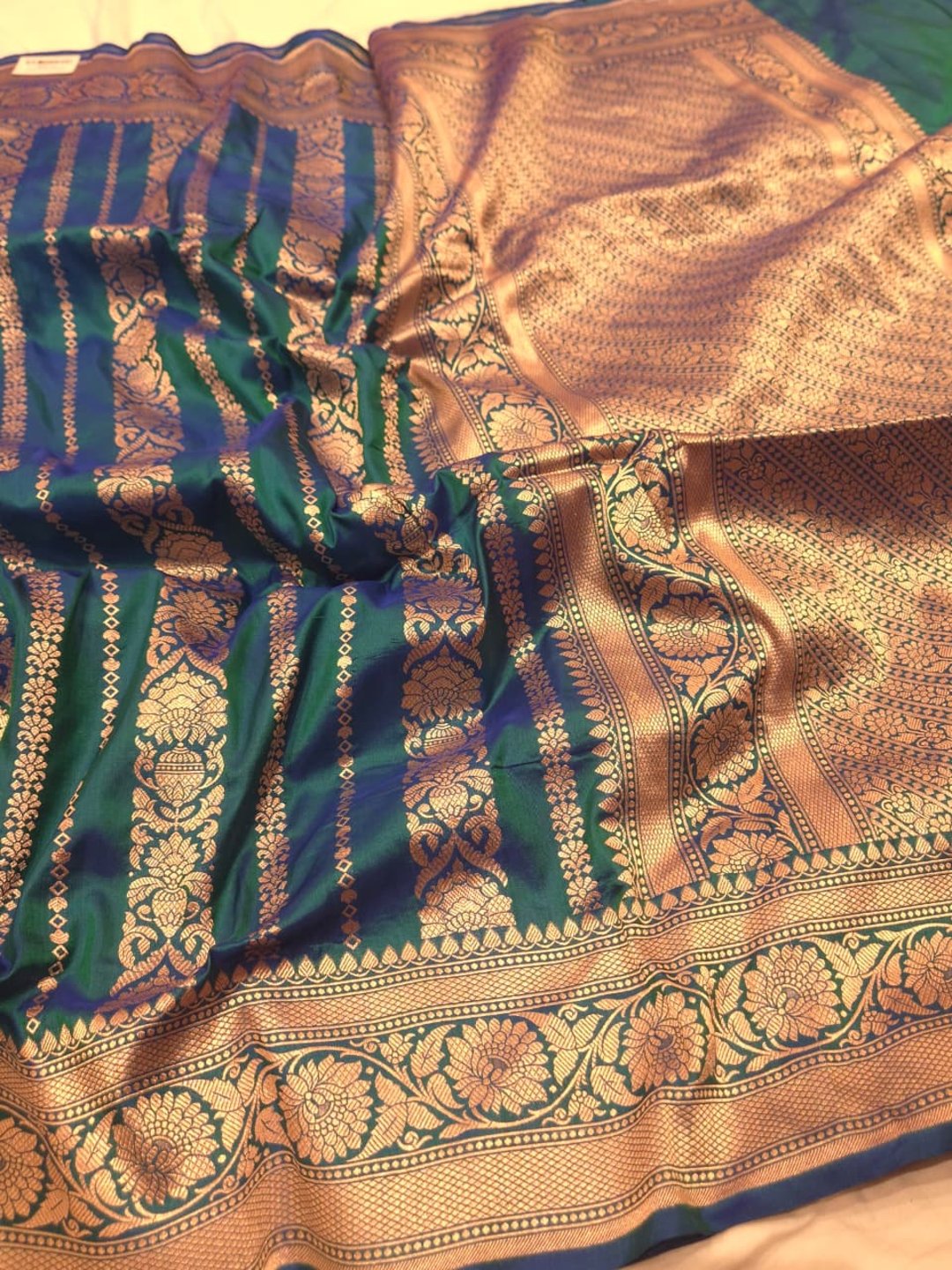 Peacock blue Katan Silk Banarasi saree front drape view