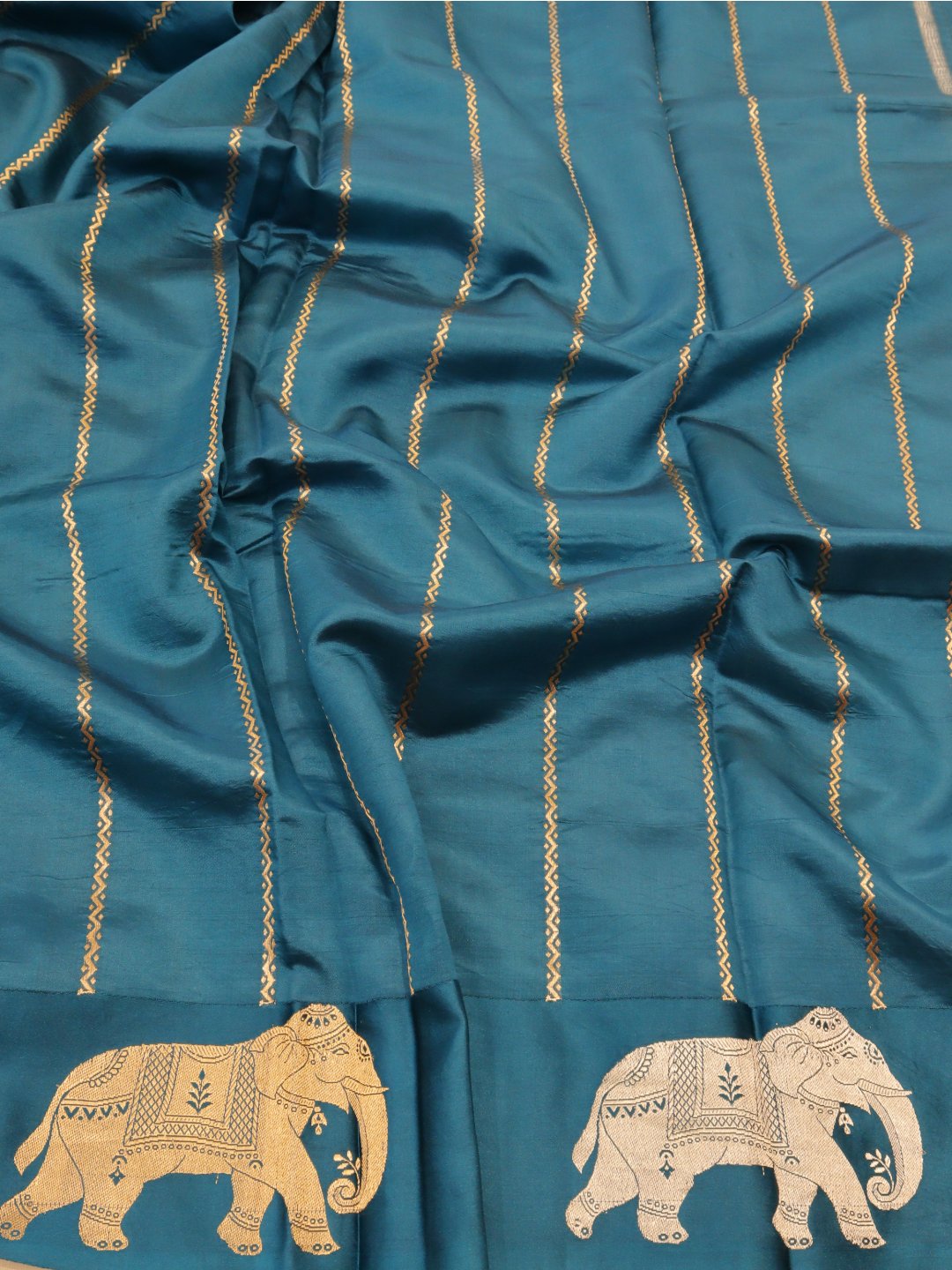 Deep teal blue with gold and silver-toned zari Katan Silk Banarasi saree full spread