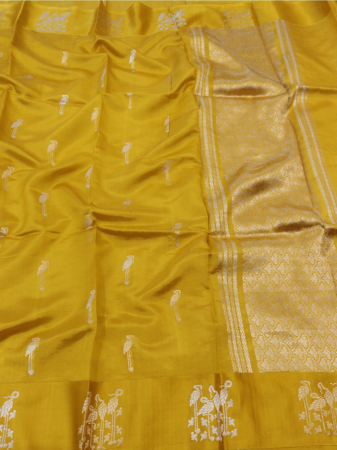 Yellow with gold and silver-toned zari Katan Silk Banarasi saree front drape view