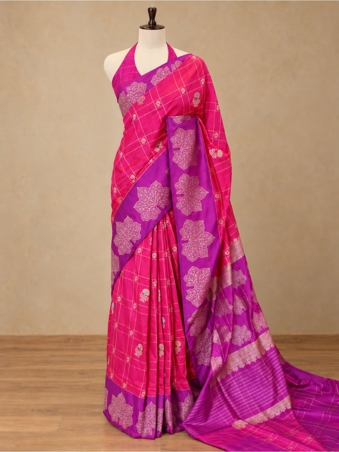 Rani pink with a contrasting purple border and pallu. Katan Silk Banarasi saree pallu detail