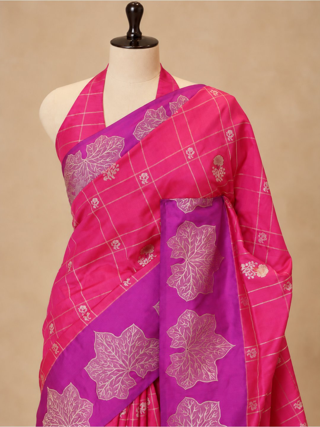 Rani pink with a contrasting purple border and pallu. Katan Silk Banarasi saree front drape view