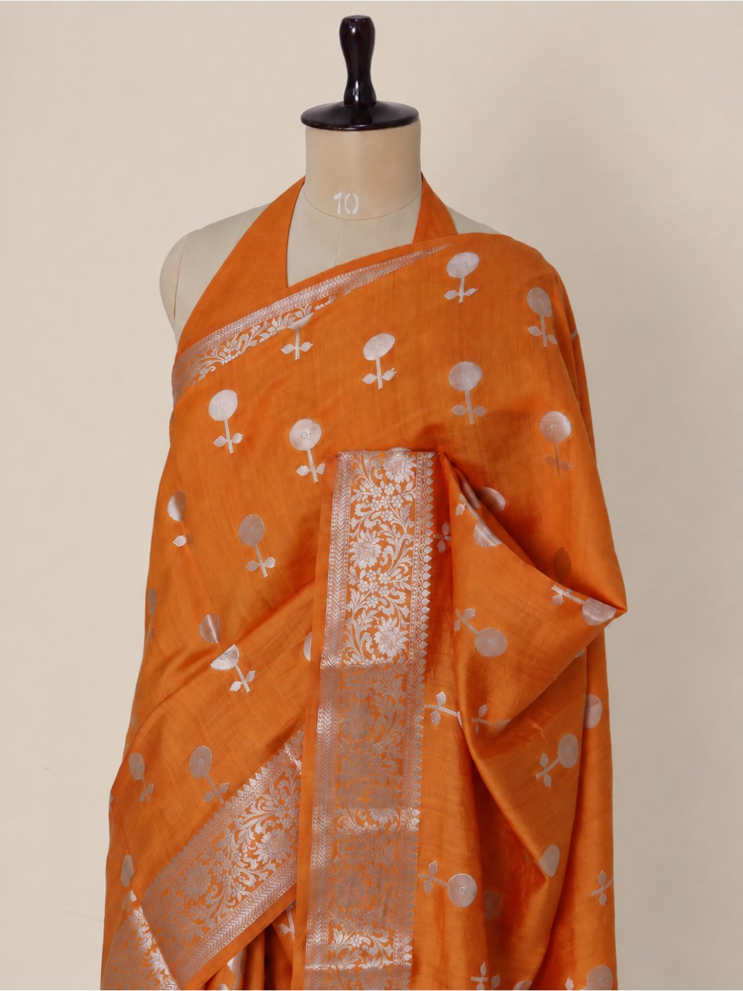 Orange with silver-toned zari detailing Chiniya Silk Banarasi saree front drape view