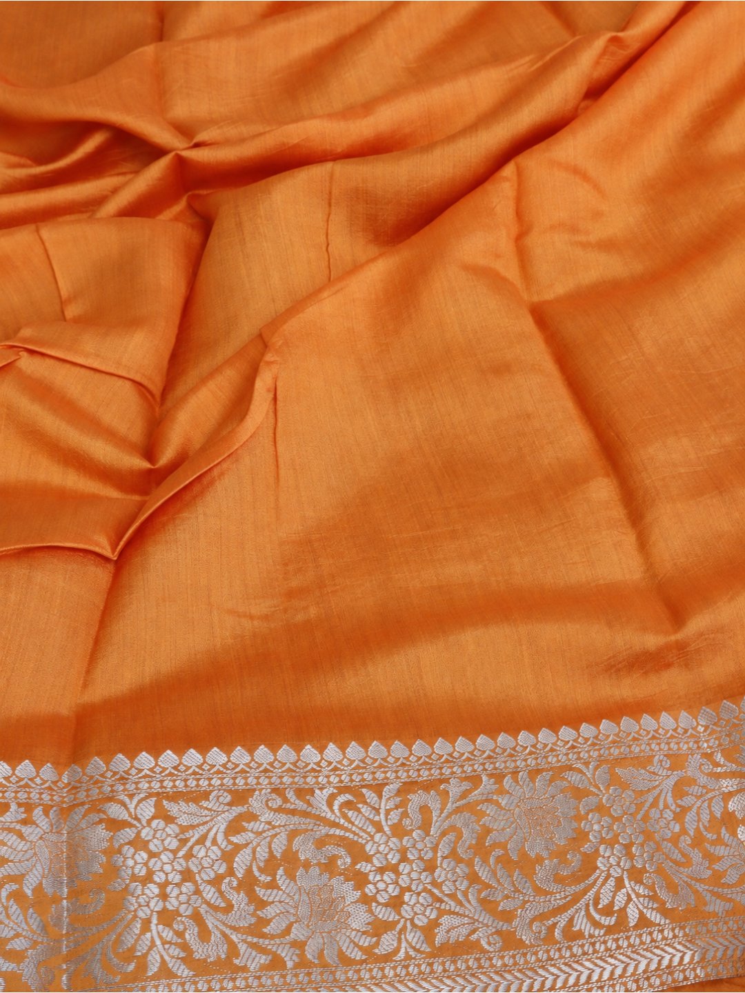 Orange with silver-toned zari detailing Chiniya Silk Banarasi saree full spread