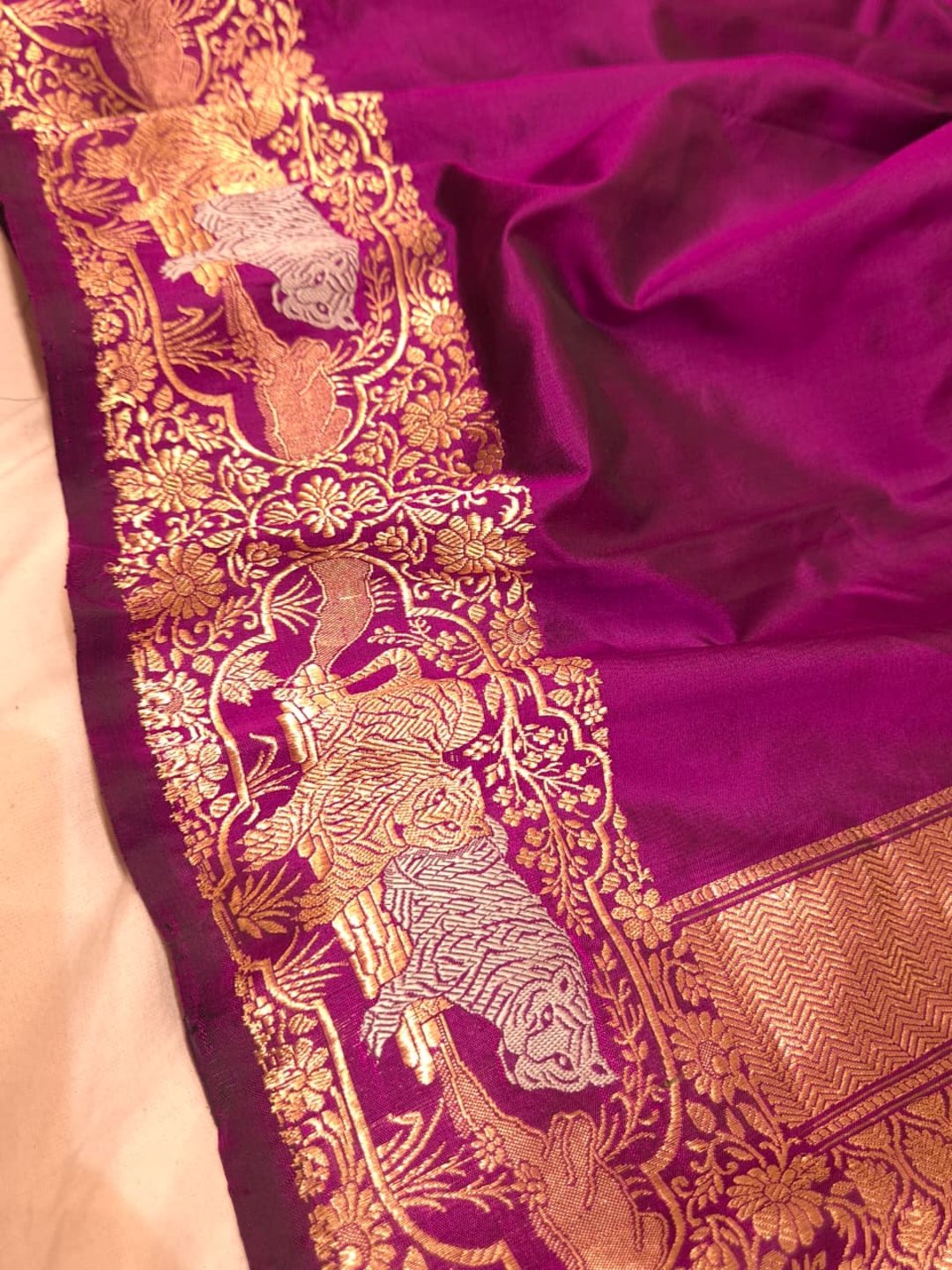 Magenta Pink with gold-toned weaving Katan Silk Banarasi saree border closeup