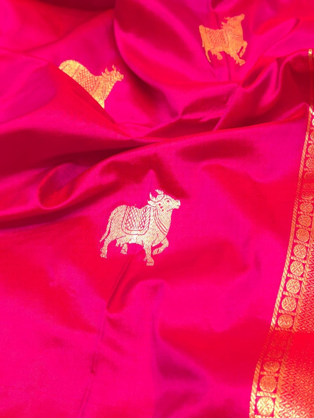 Rani Pink with gold-toned weaving Katan Silk Banarasi saree border closeup