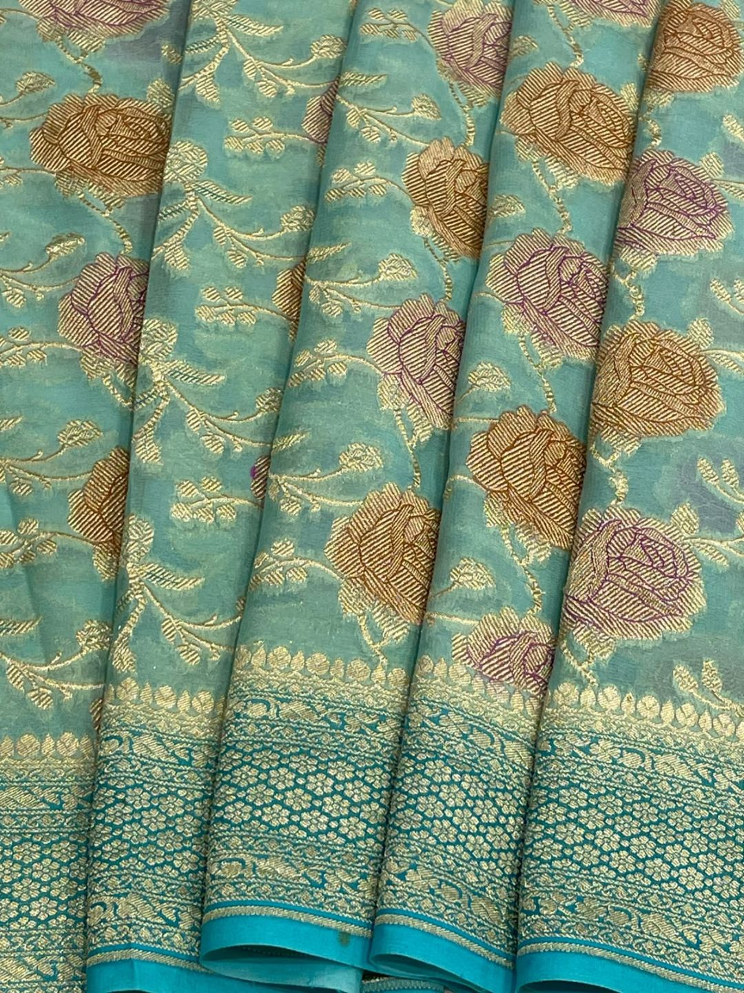 Sea green Georgette Banarasi saree pallu detail