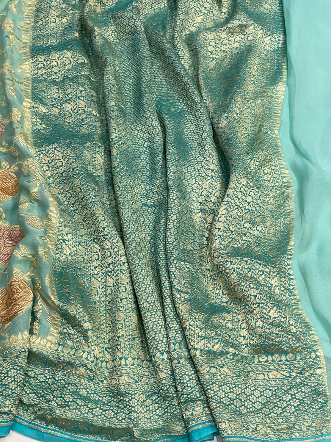 Sea green Georgette Banarasi saree border closeup