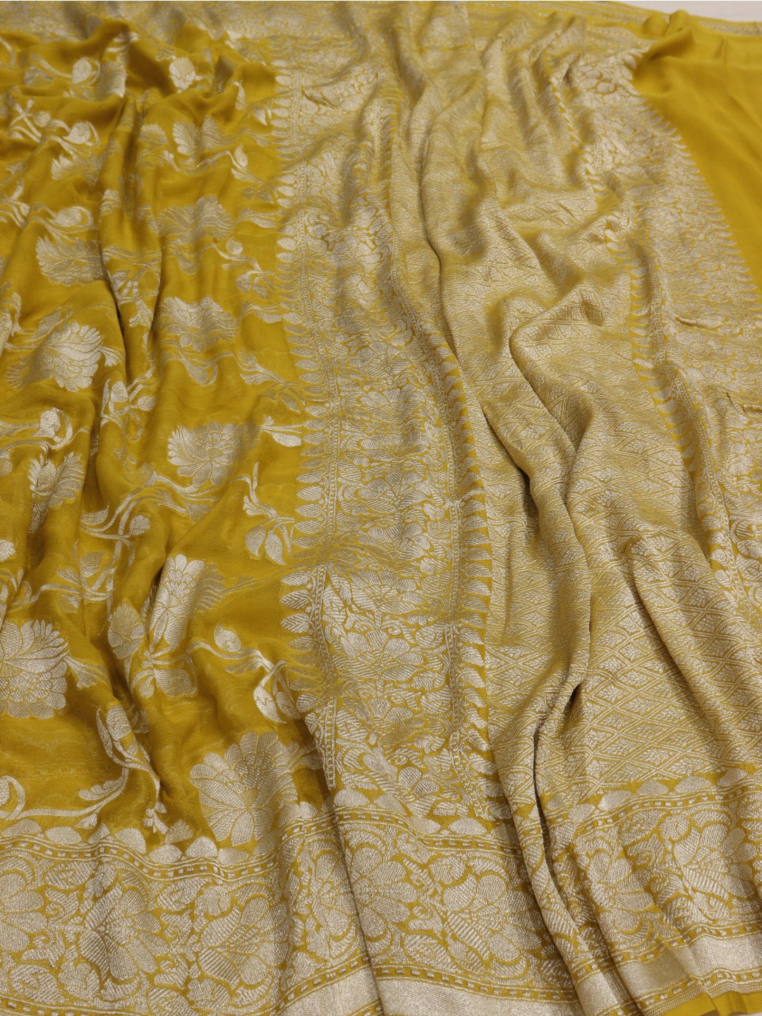 Musturd yellow silver zari jaal work Georgette Banarasi saree front drape view