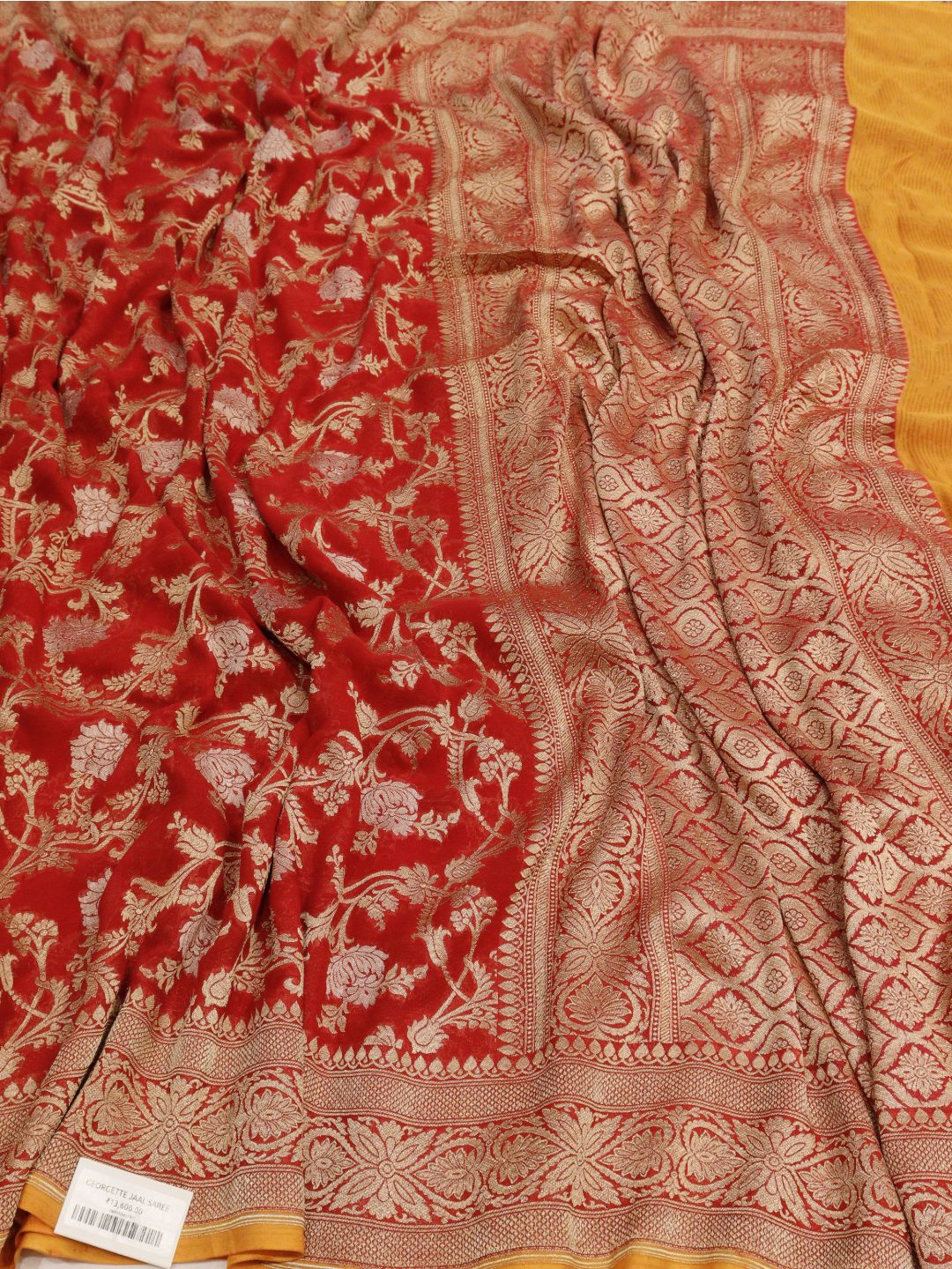 Dark Red with orange border tone Georgette Banarasi saree front drape view