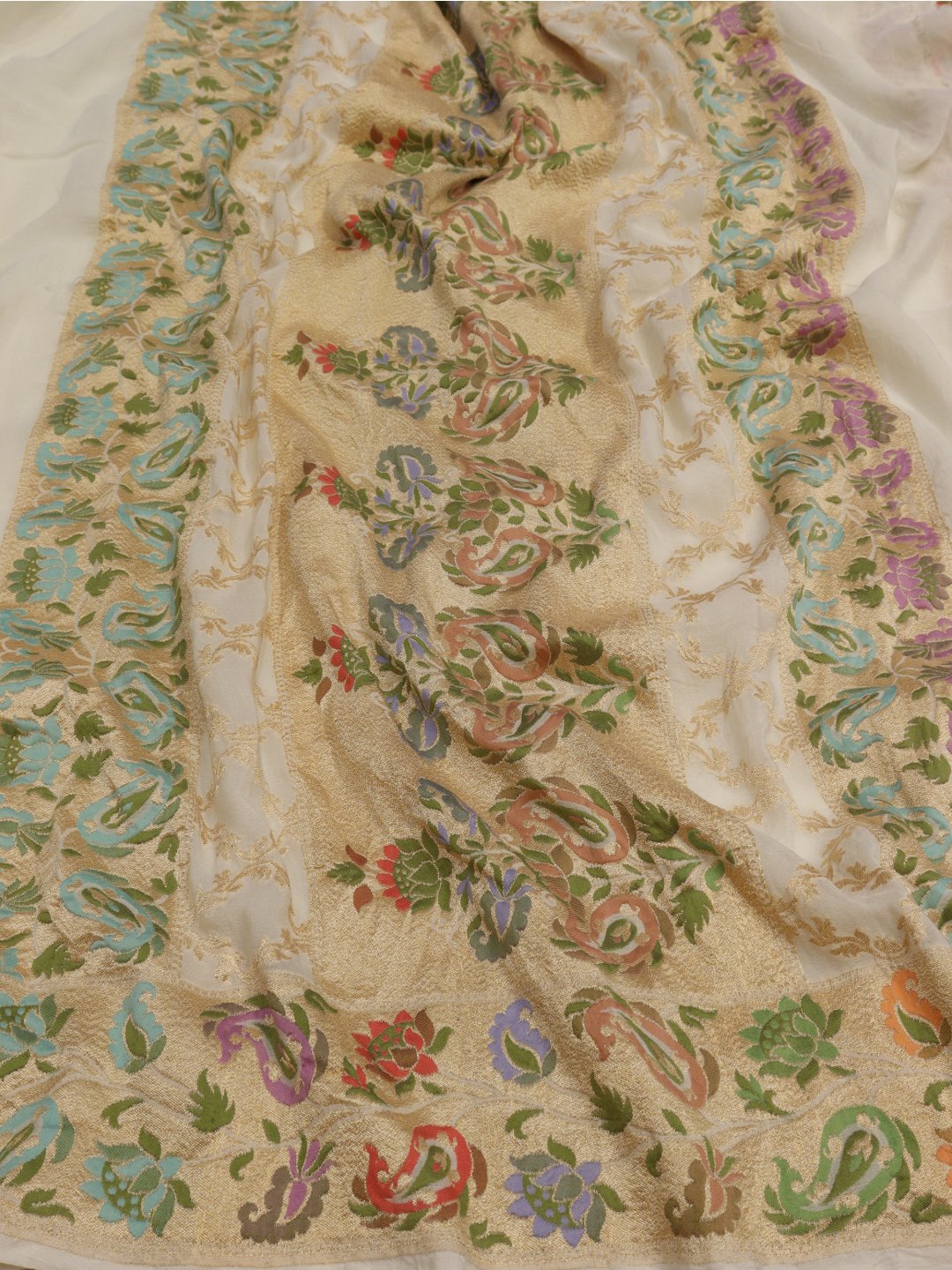 white with multicolor floral jaal work Georgette Banarasi saree border closeup
