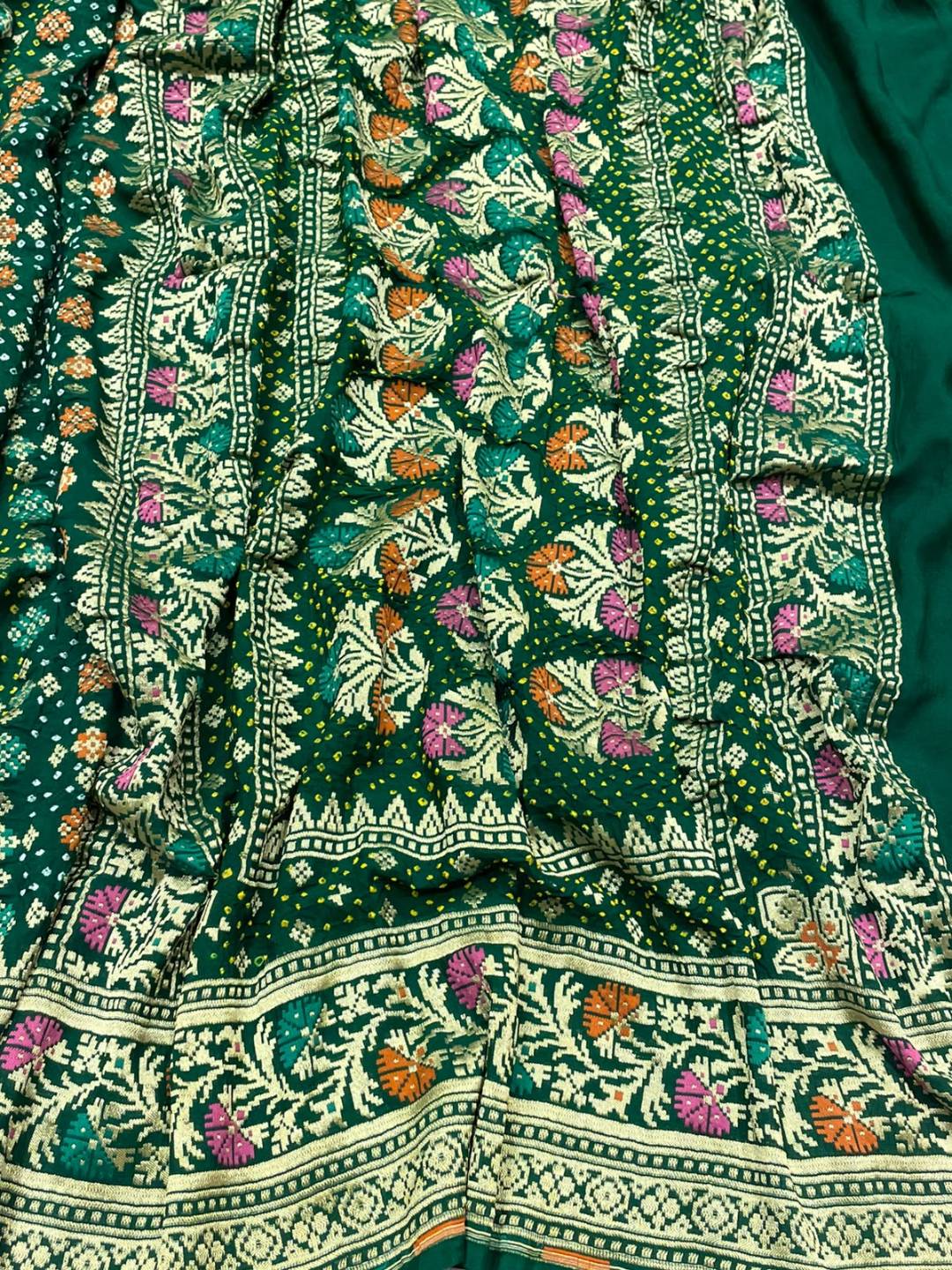 Bottle green with Golden floral work Bandhani Banarasi saree border closeup