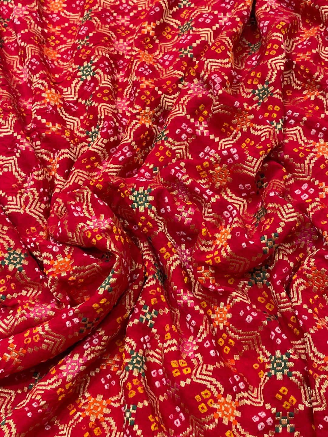 Dark red with Golden floral work Bandhani Banarasi saree front drape view