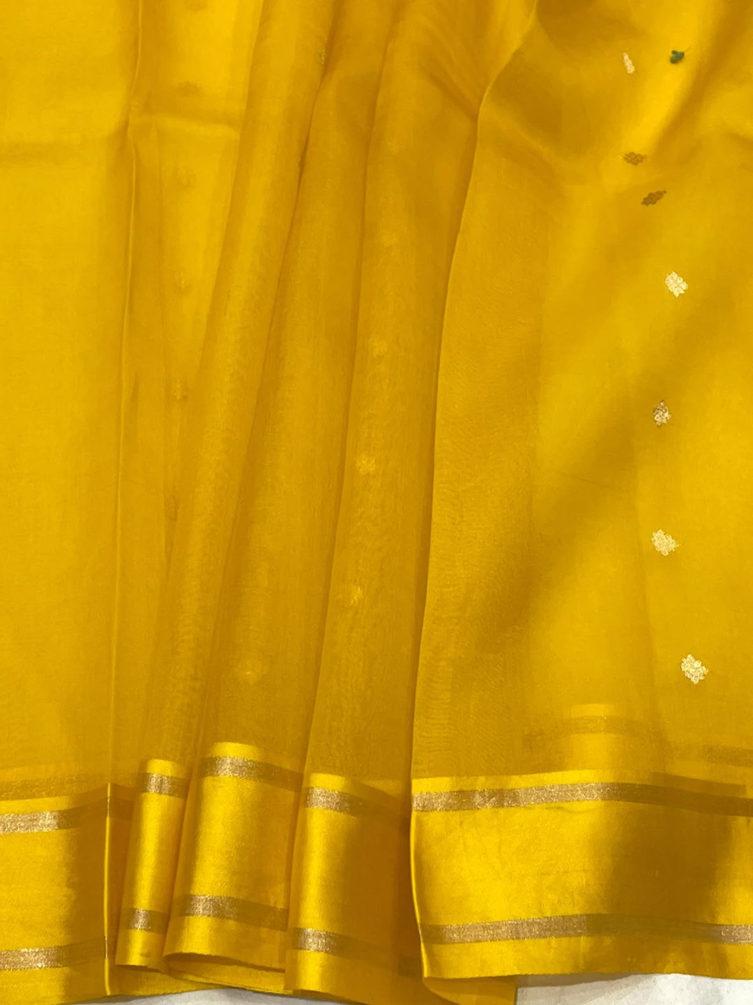 Dark yellow Kora Silk Banarasi saree pallu detail