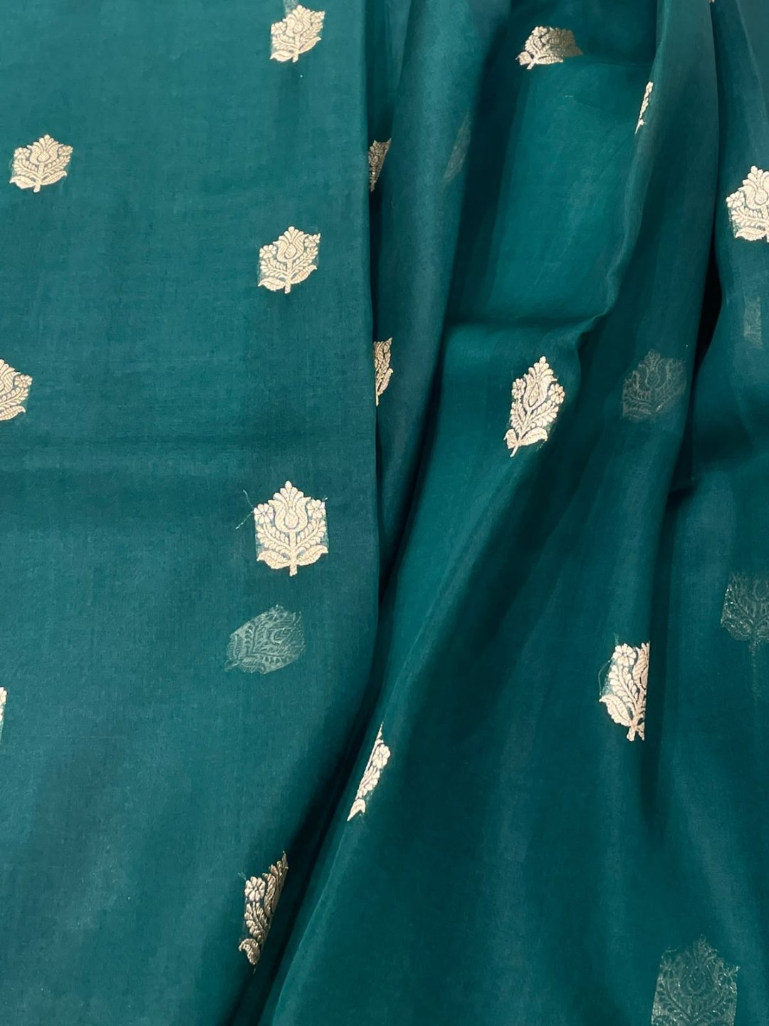 Bottle Green Kora Silk Banarasi saree border closeup