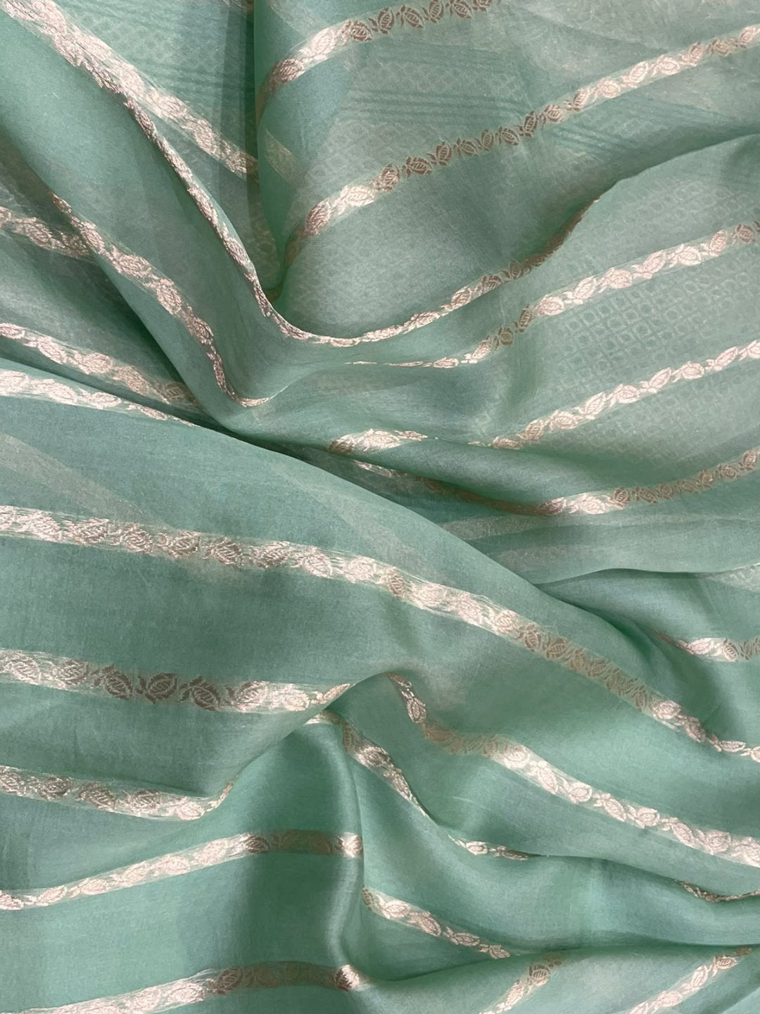 light green Kora Silk Banarasi saree texture detail