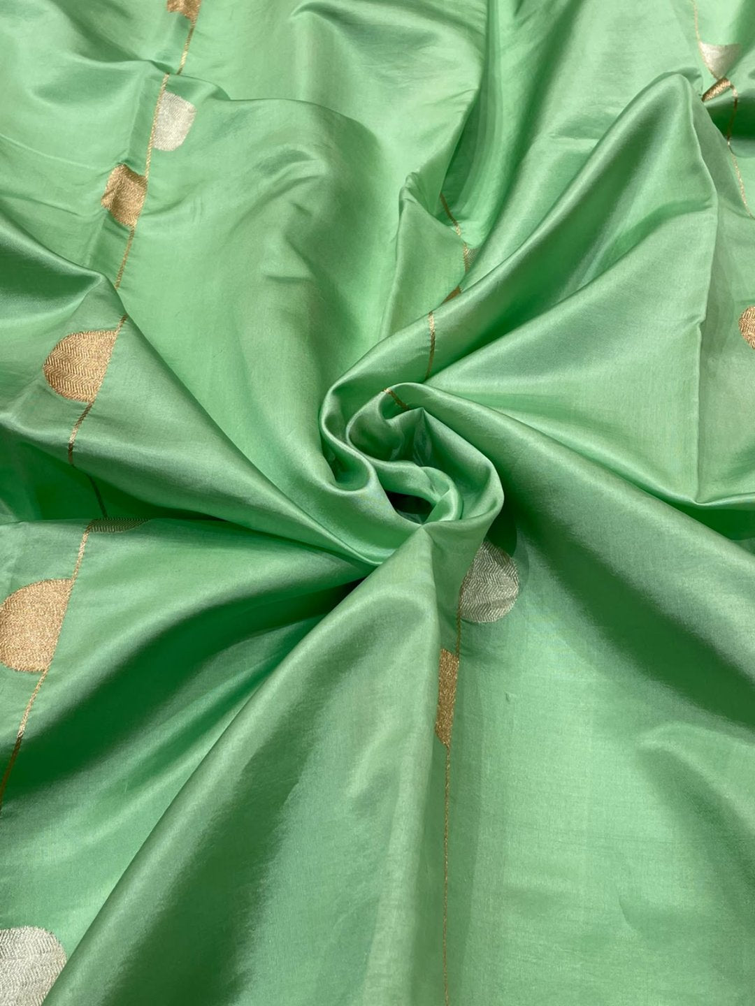 Green Katan Silk Banarasi saree border closeup