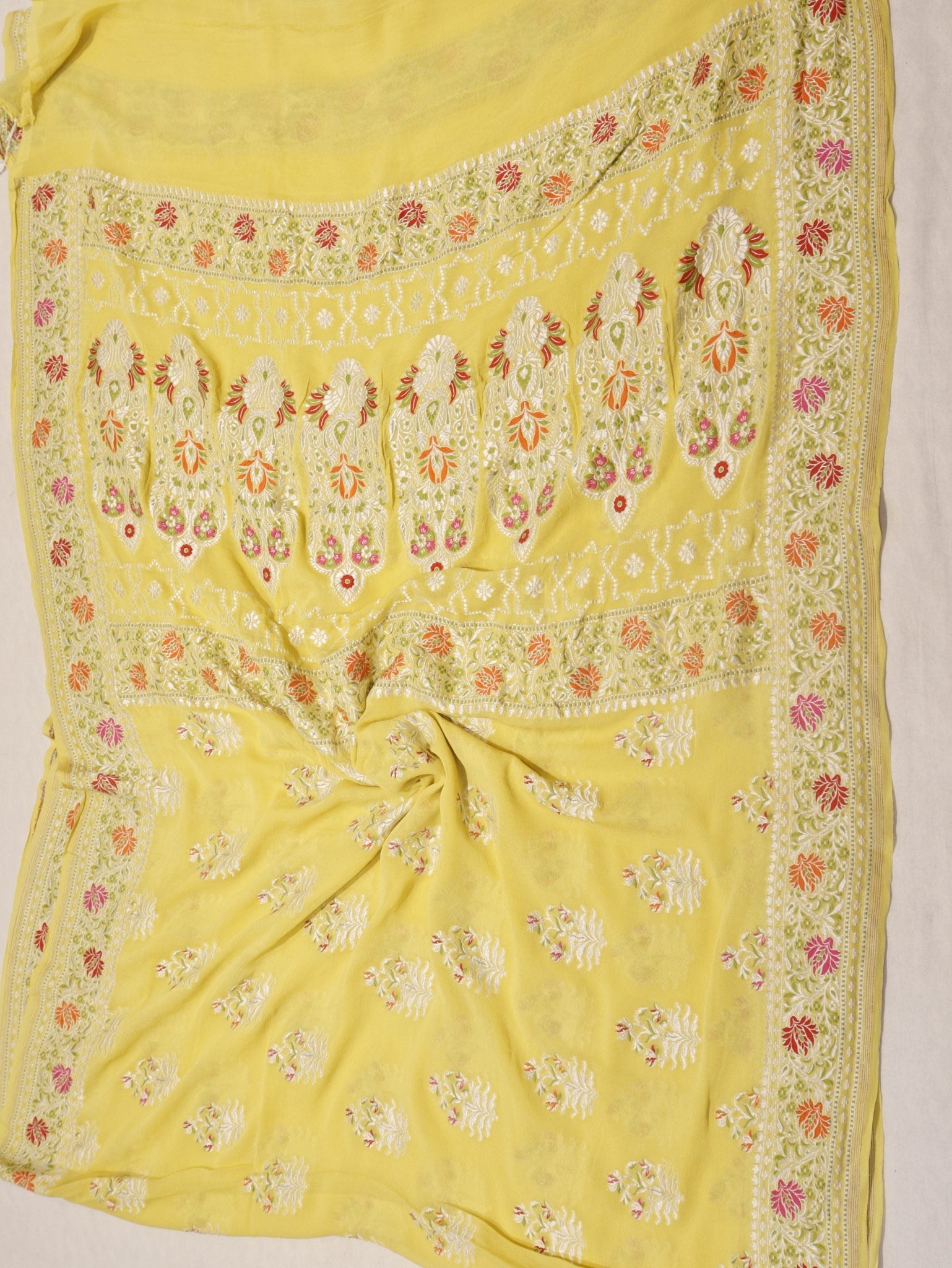 Yellow Khaddi Georgette Banarasi saree folded view – Hikayat Banaras
