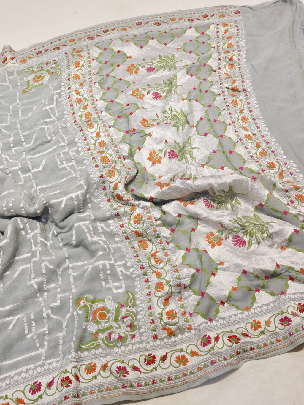 Grey Khaddi Georgette Banarasi saree border closeup – Hikayat Banaras