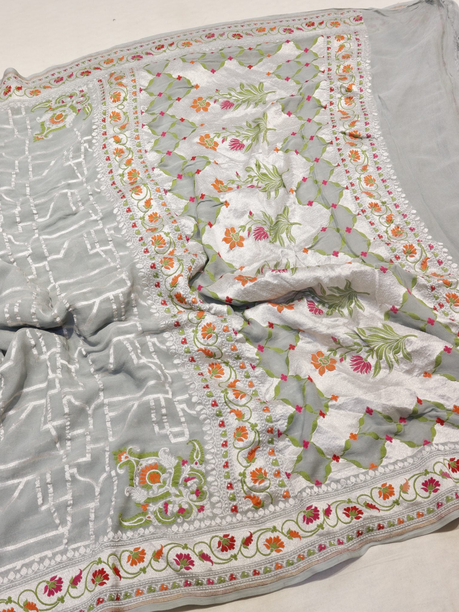Grey Khaddi Georgette Banarasi saree border closeup – Hikayat Banaras