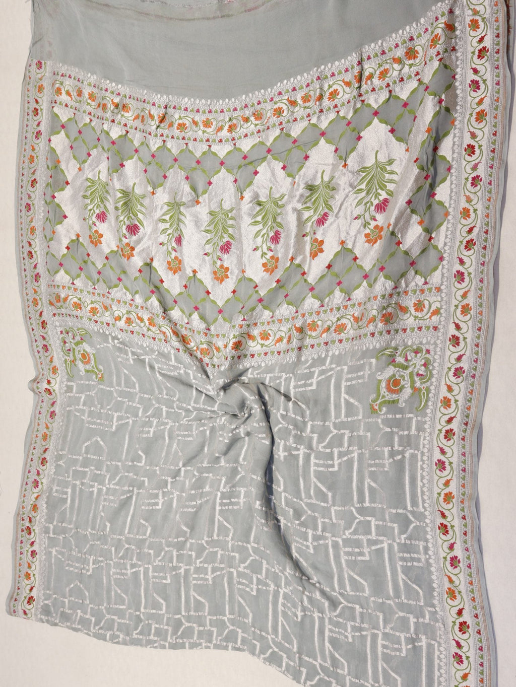 Grey Khaddi Georgette Banarasi saree folded view – Hikayat Banaras