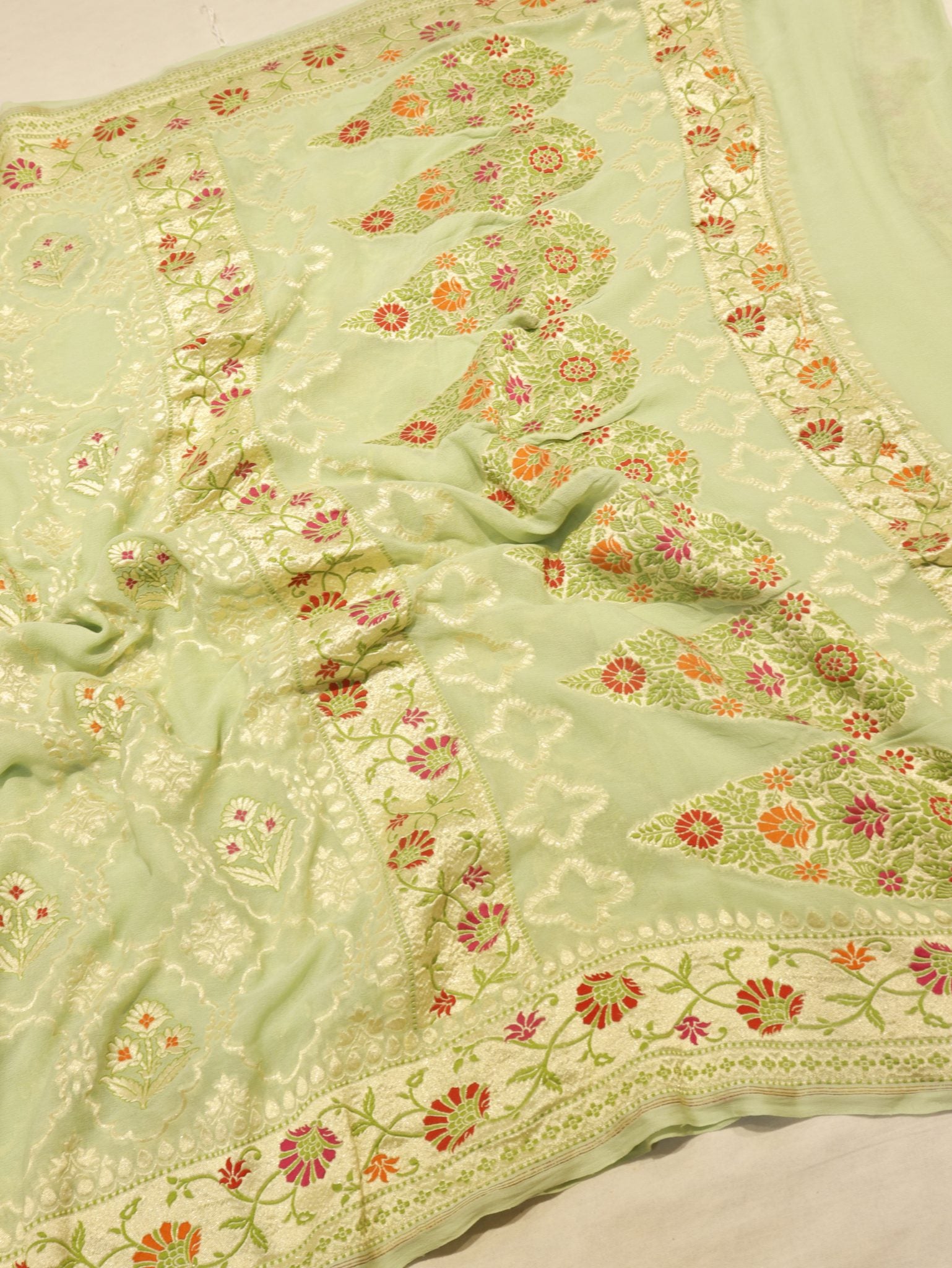 Green Khaddi Georgette Banarasi saree border closeup – Hikayat Banaras