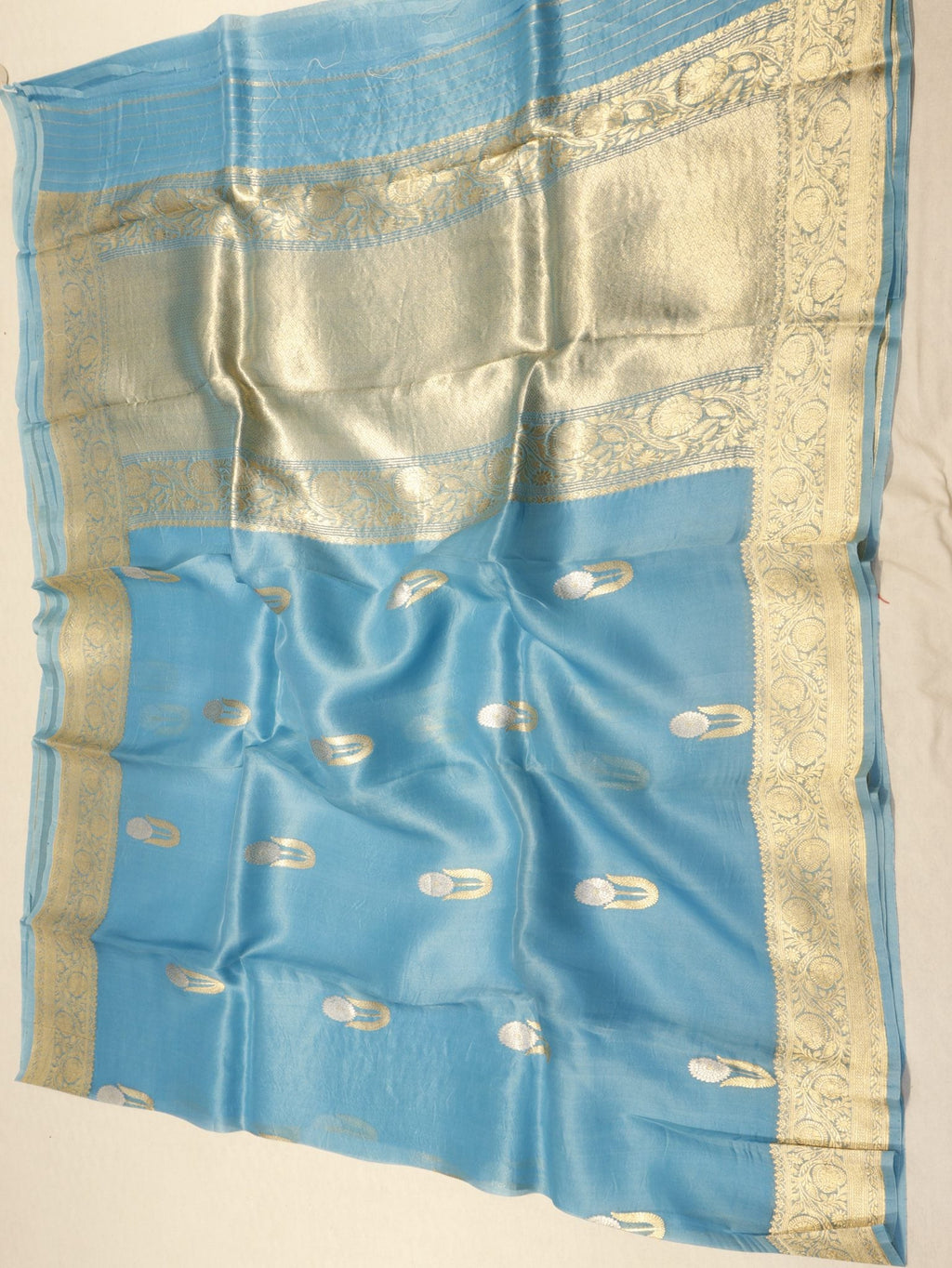 Sky Blue Kora Silk Banarasi saree folded view – Hikayat Banaras