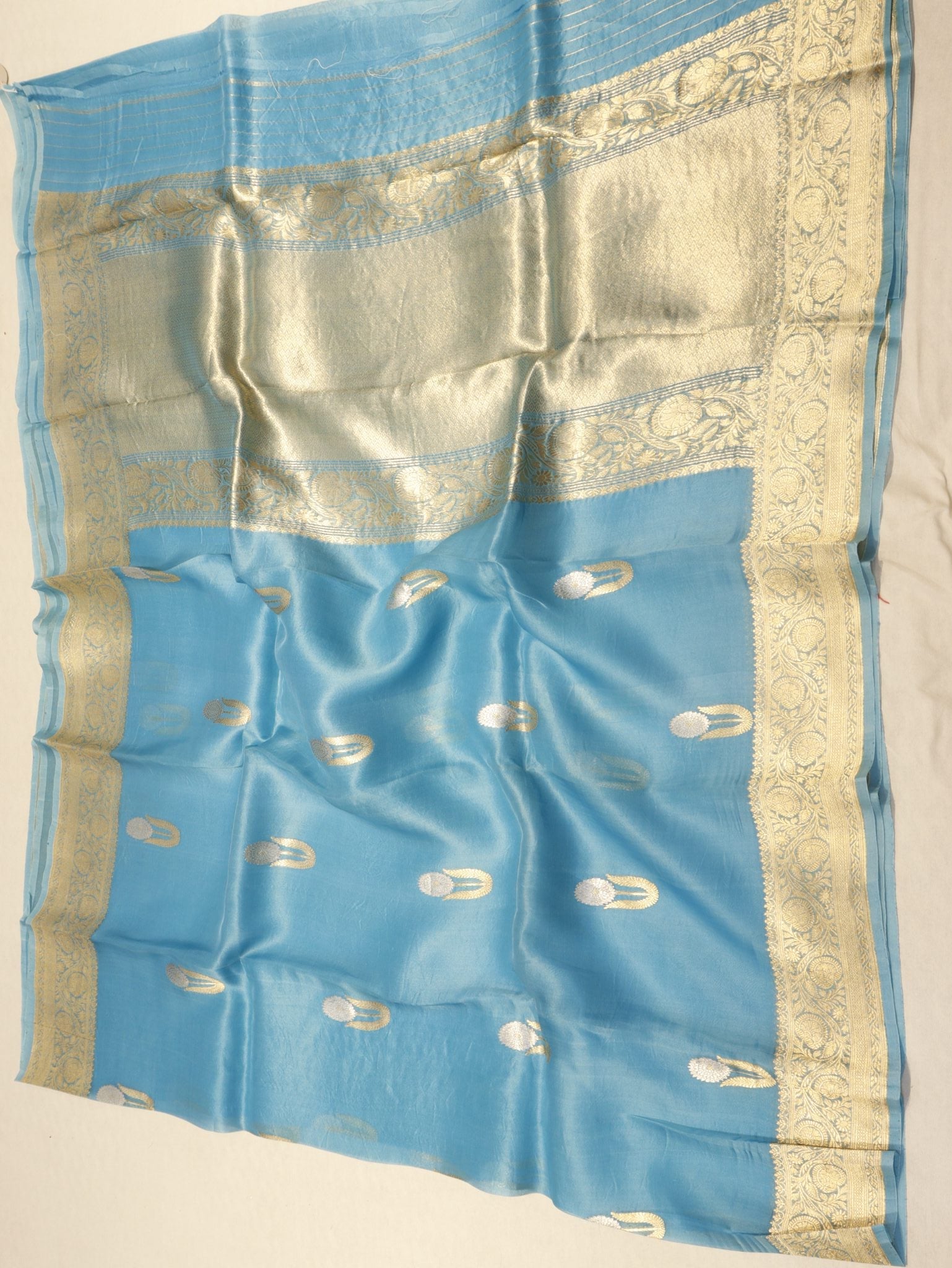 Sky Blue Kora Silk Banarasi saree folded view – Hikayat Banaras