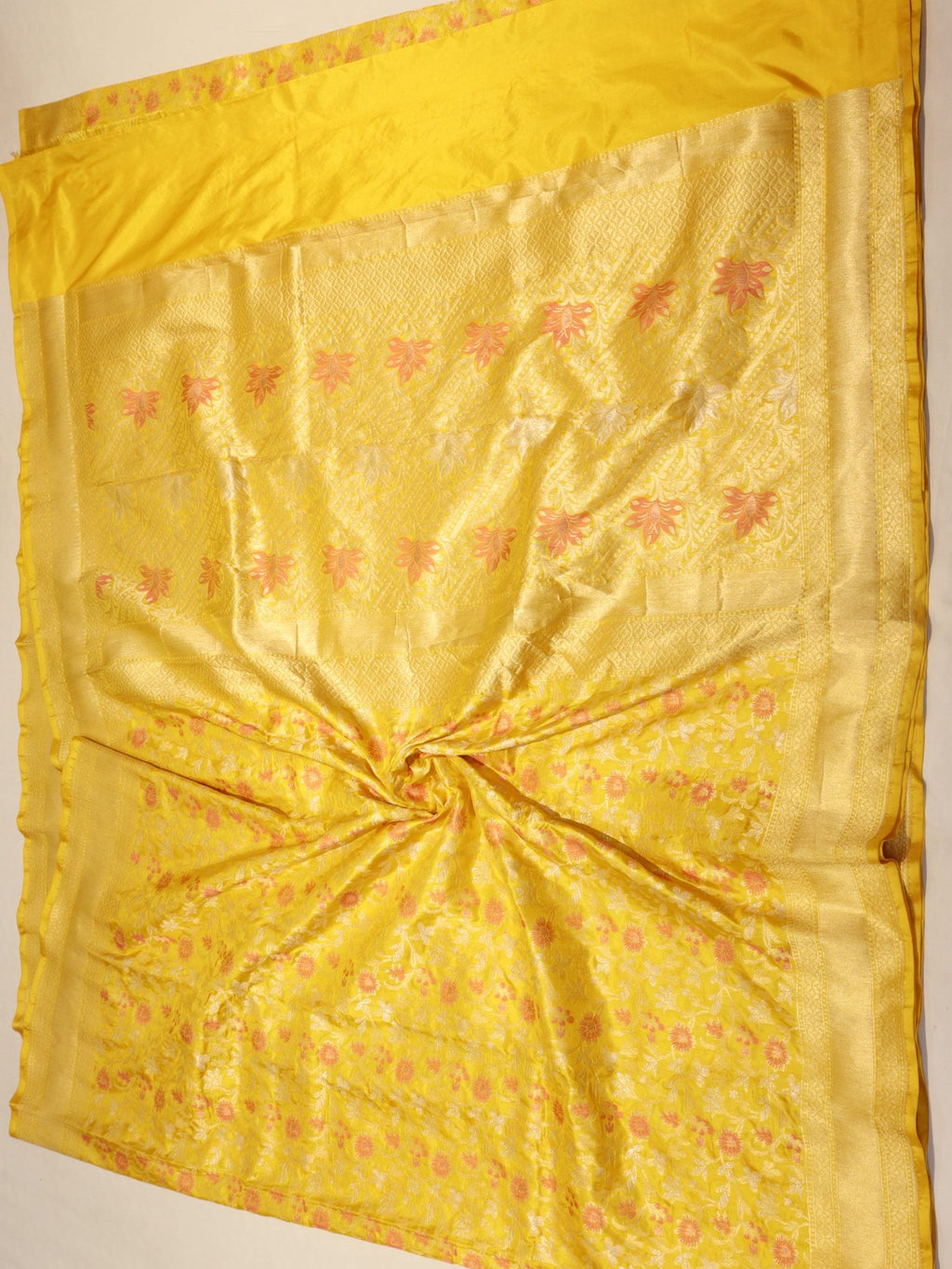 Yellow Katan Silk Banarasi saree folded view – Hikayat Banaras