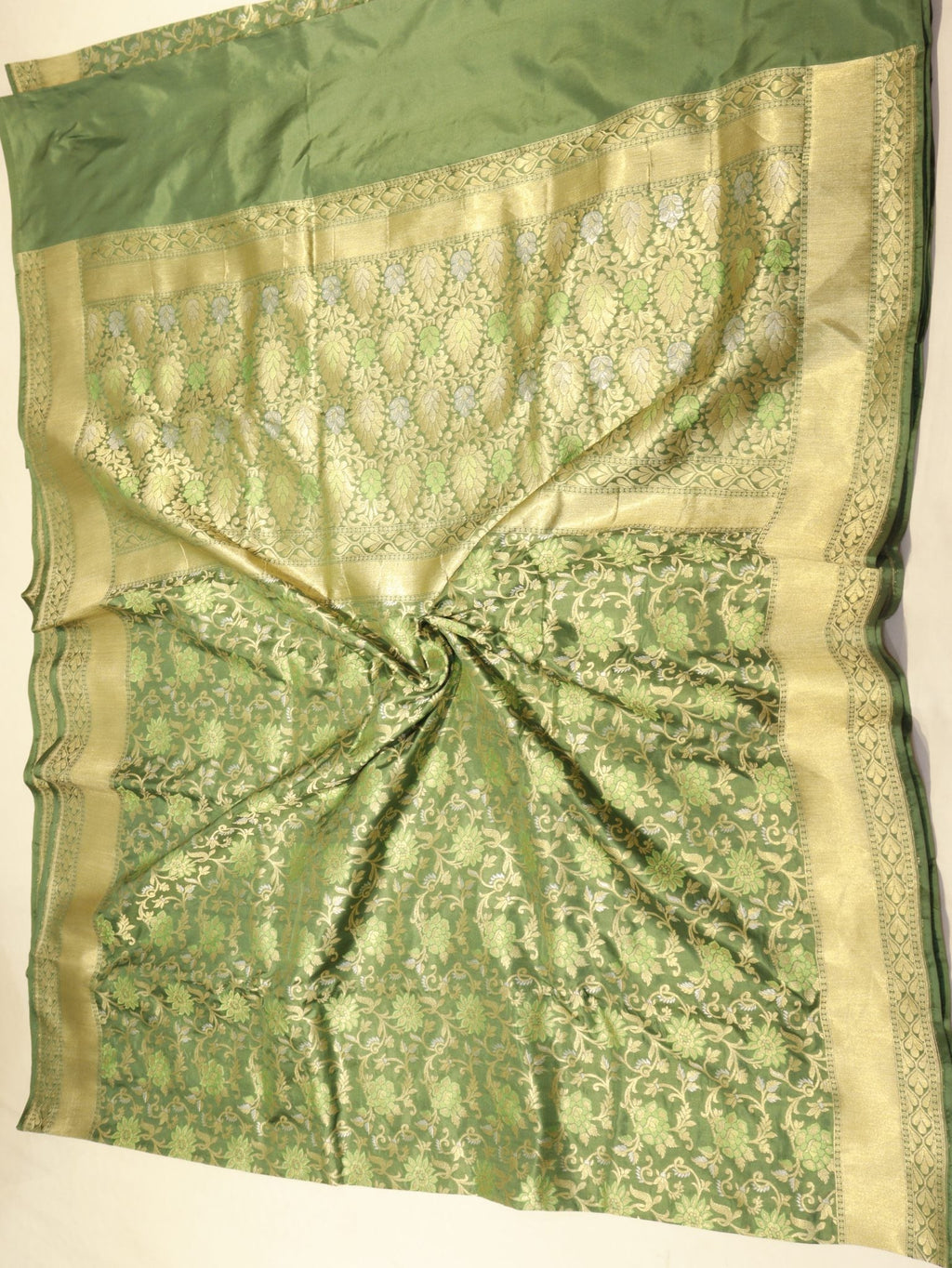 Bottle Green Katan Silk Banarasi saree folded view – Hikayat Banaras