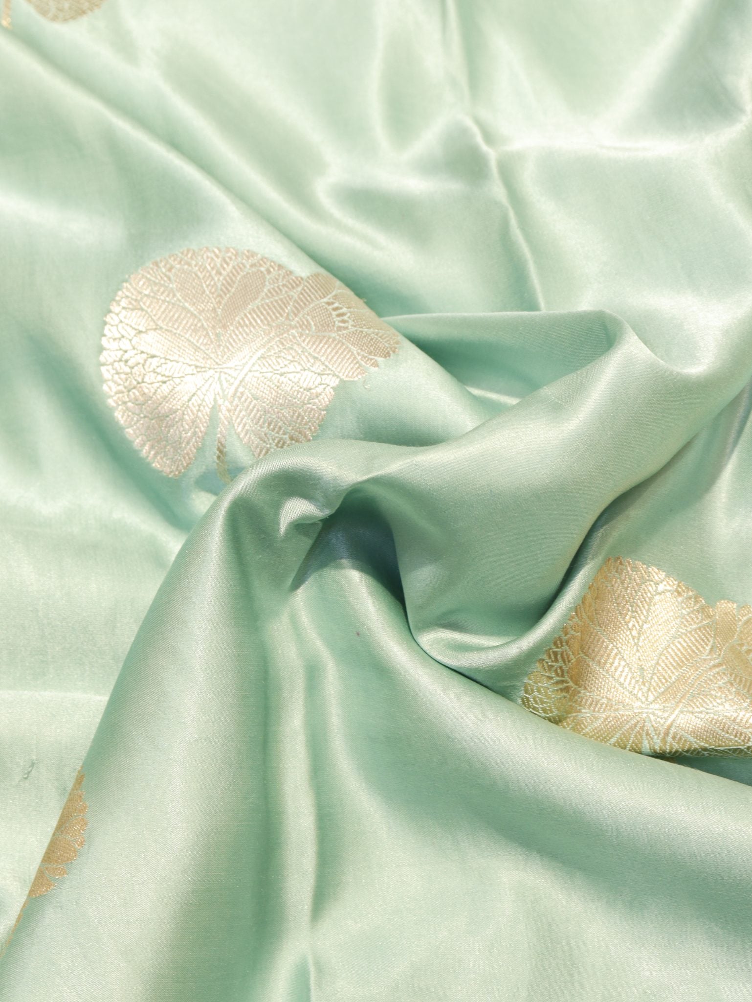 Pale Turquoise Mashru Silk Banarasi saree border closeup