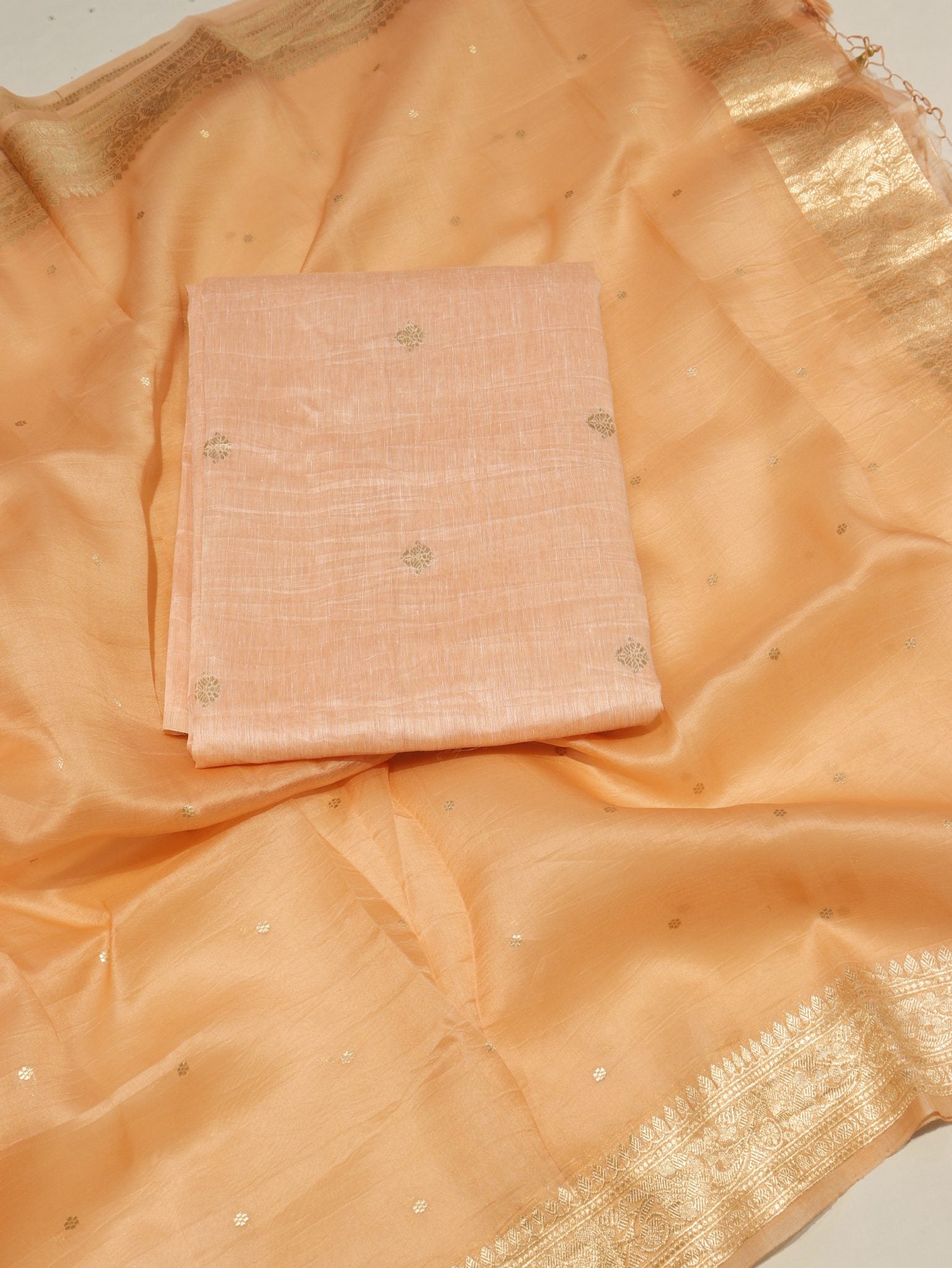 Calm Orange Linen Banarasi suit front drape view