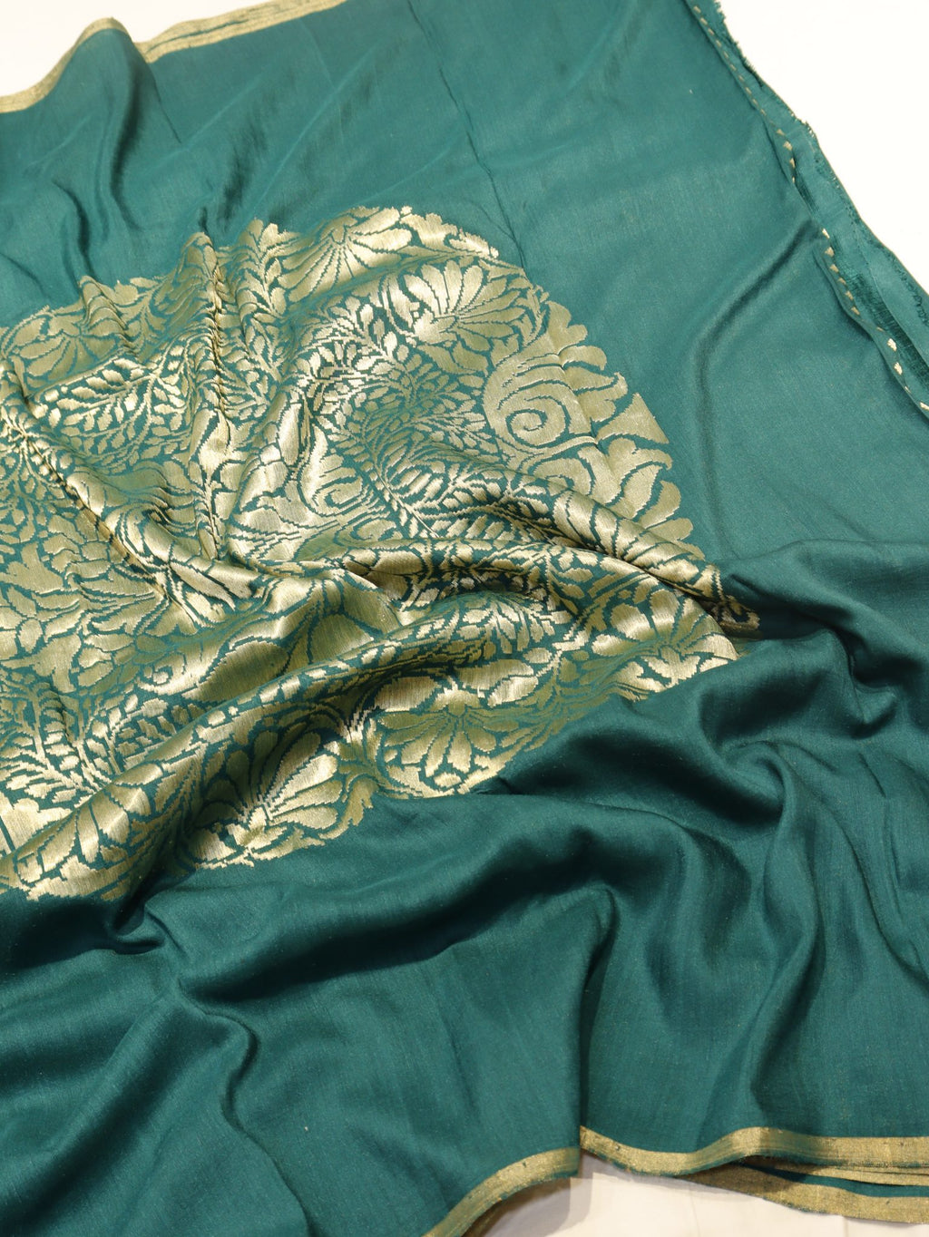 Bottle Green Moonga Silk Banarasi saree border closeup
