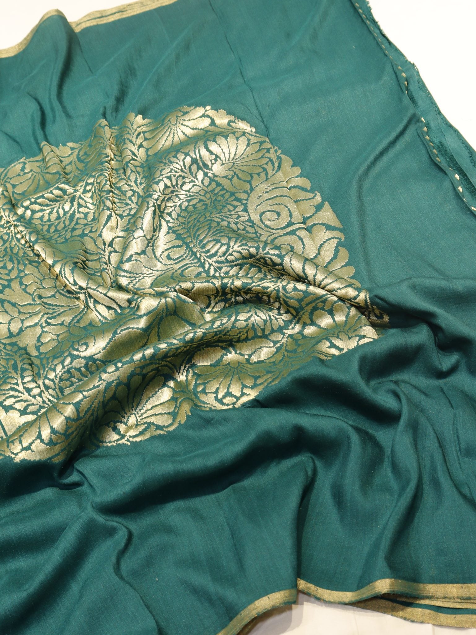 Bottle Green Moonga Silk Banarasi saree border closeup