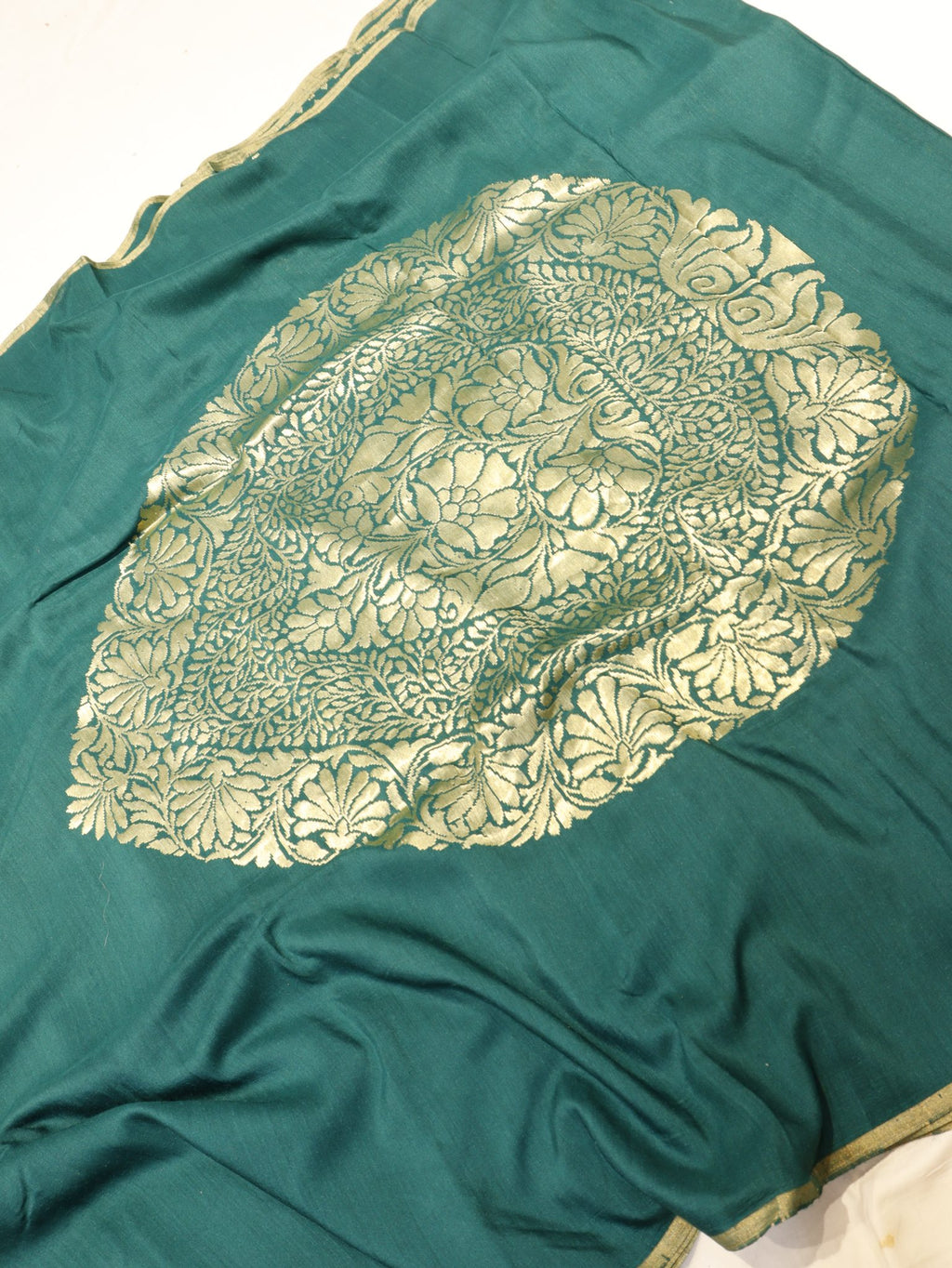Bottle Green Moonga Silk Banarasi saree folded view