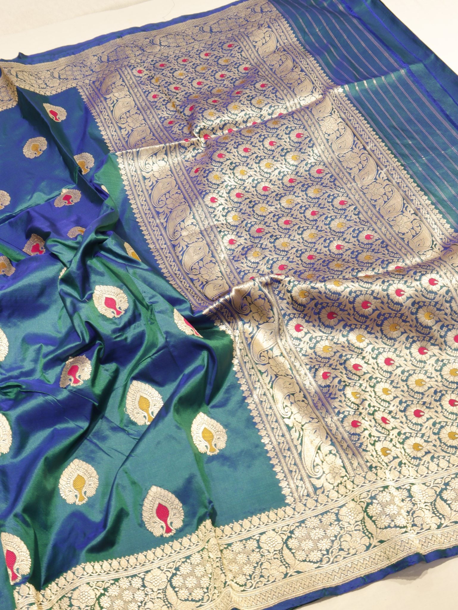 Peacock Blue Dual Shade Katan Silk Banarasi saree border closeup