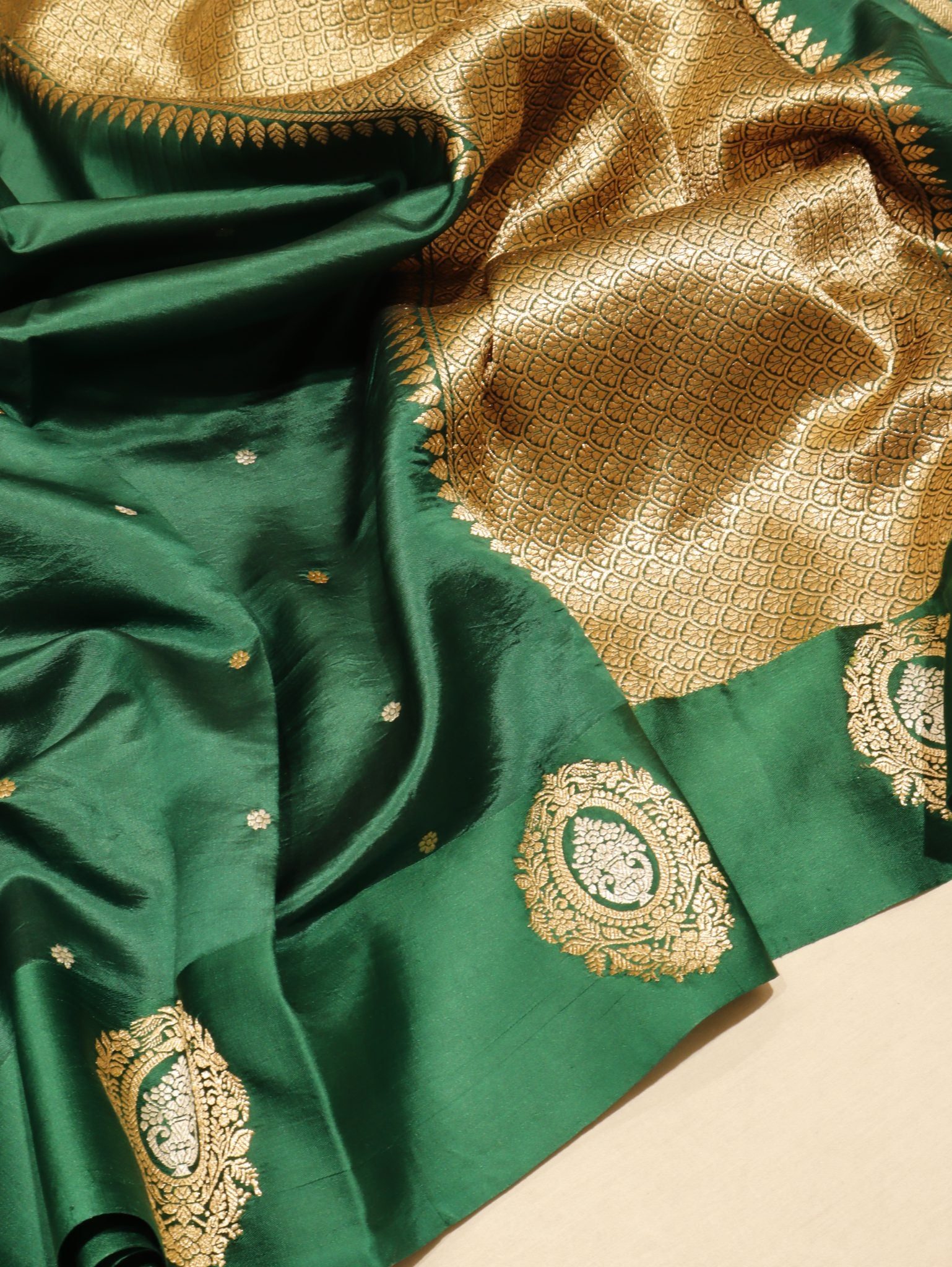 Bottle Green Soft Katan Banarasi saree pallu detail