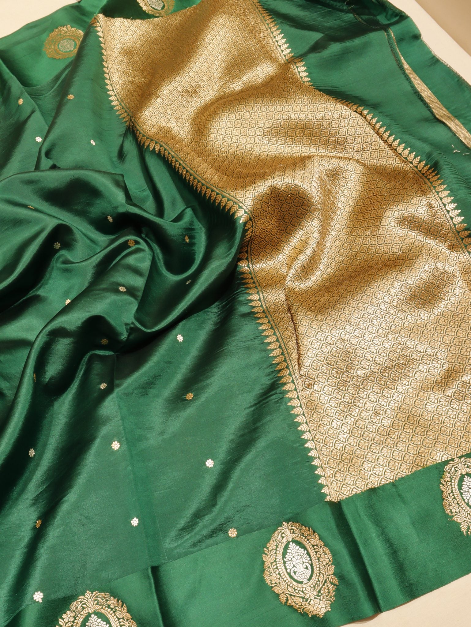 Bottle Green Soft Katan Banarasi saree border closeup