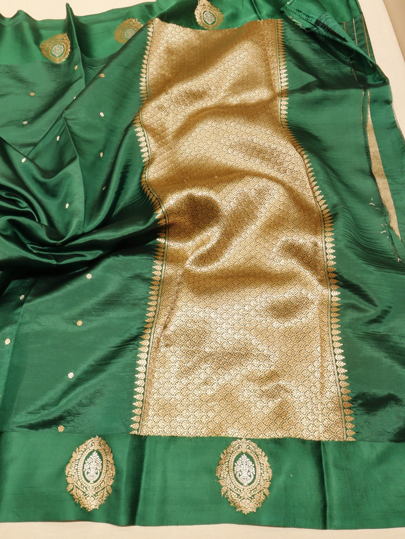 Bottle Green Soft Katan Banarasi saree texture detail