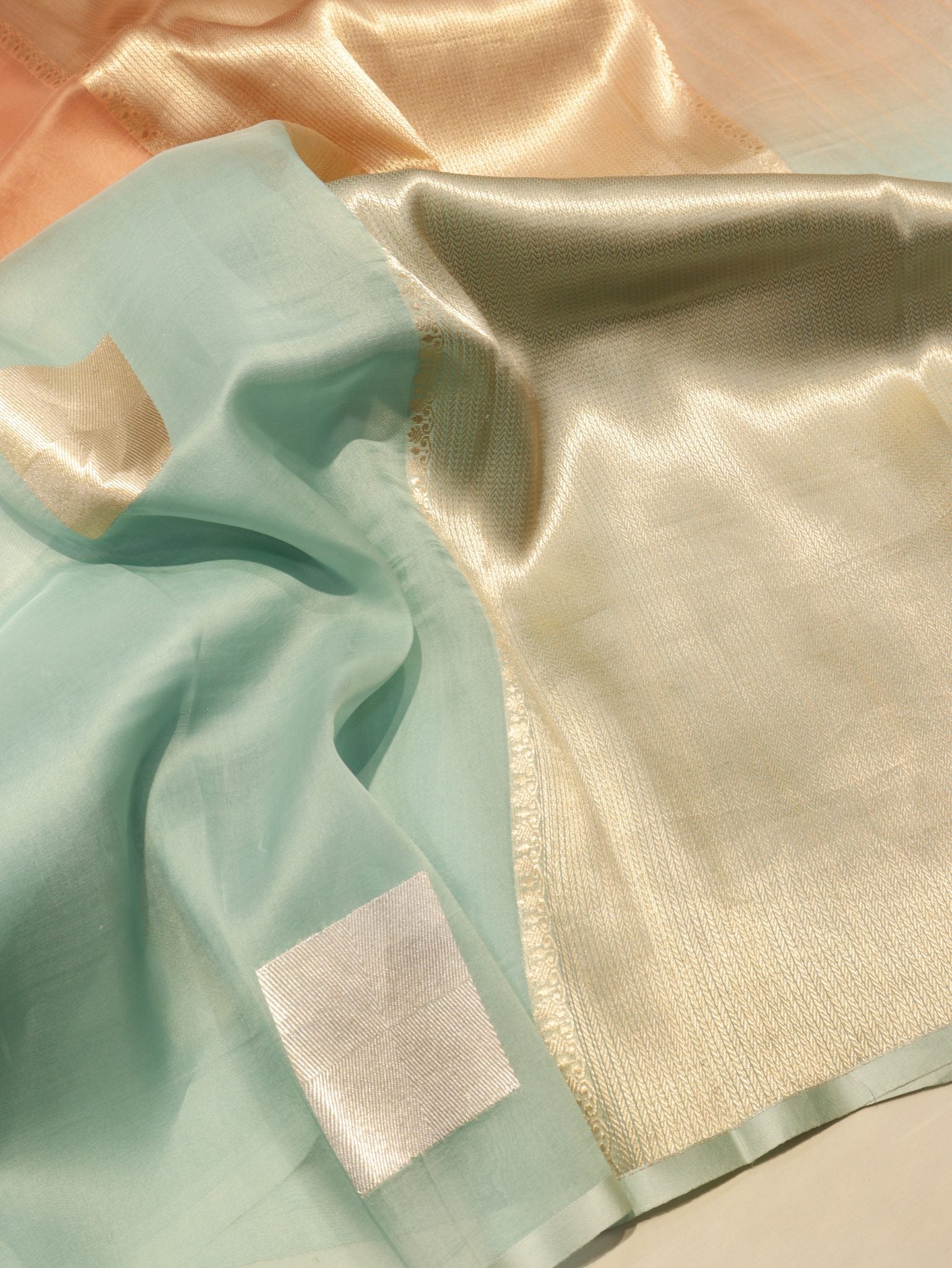 Ombre - soft peach, mint blu Kora Silk Banarasi saree front drape view