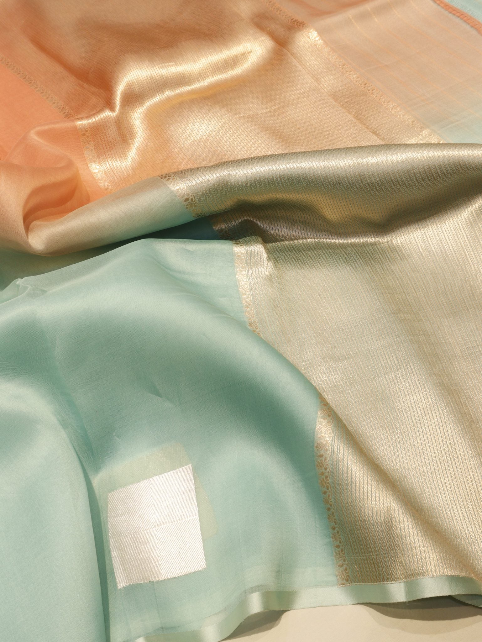 Ombre - soft peach, mint blu Kora Silk Banarasi saree pallu detail