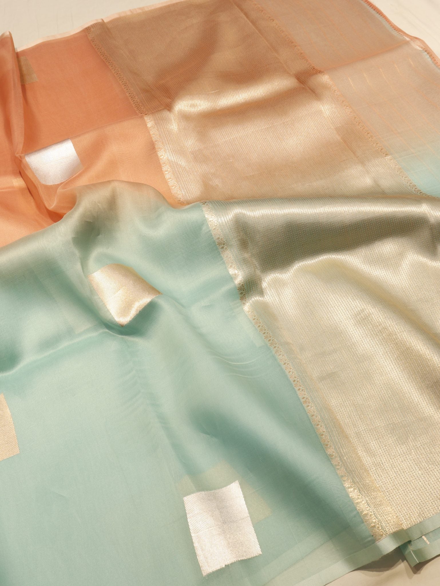 Ombre - soft peach, mint blu Kora Silk Banarasi saree border closeup