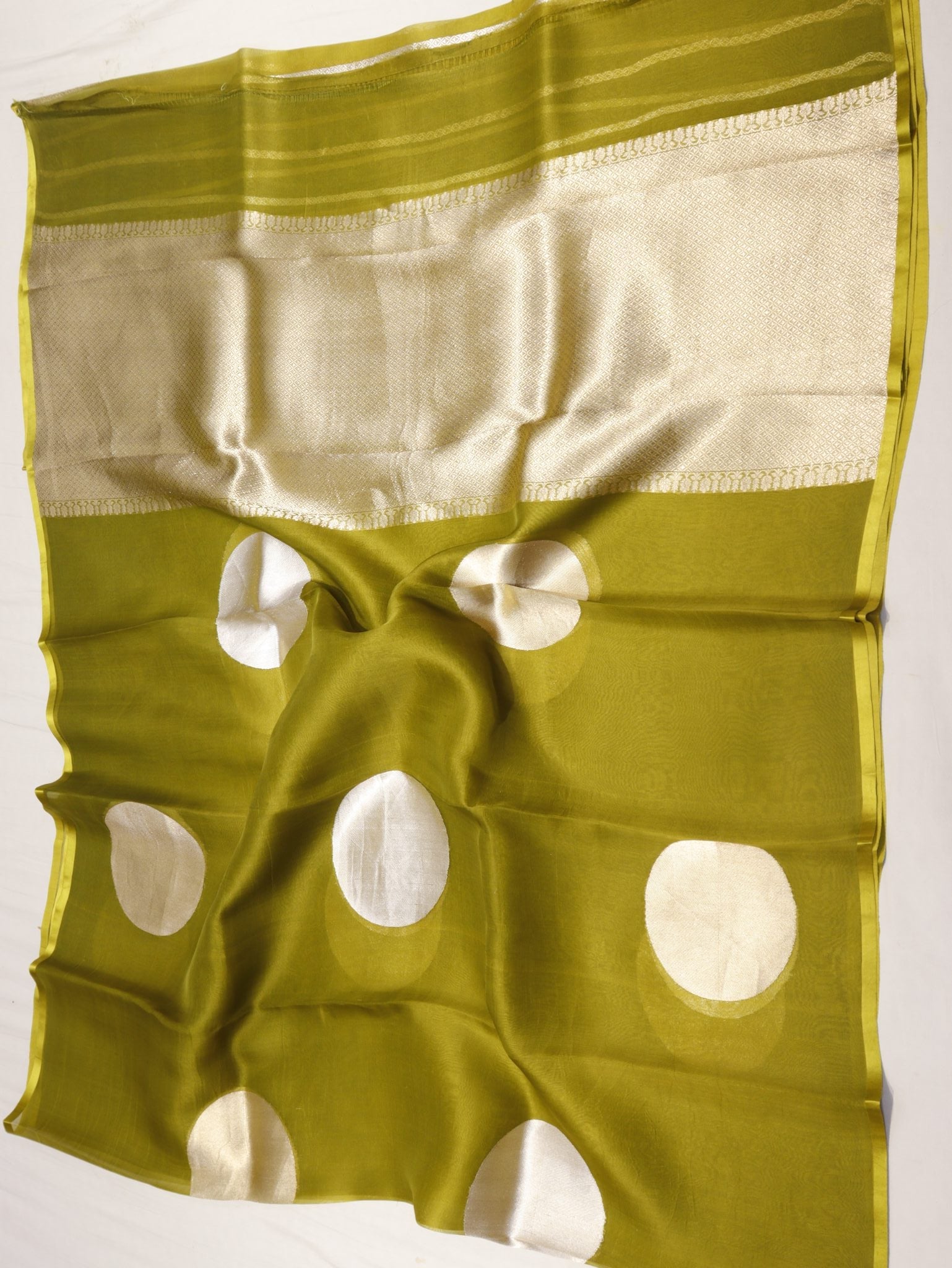 Mehendi Green Kora Silk Banarasi saree folded view